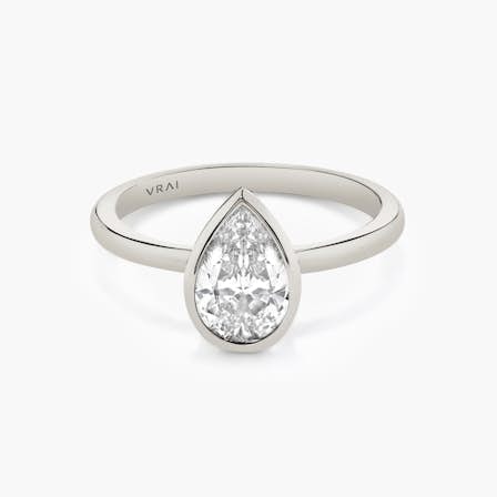 Signature bezel pear ring