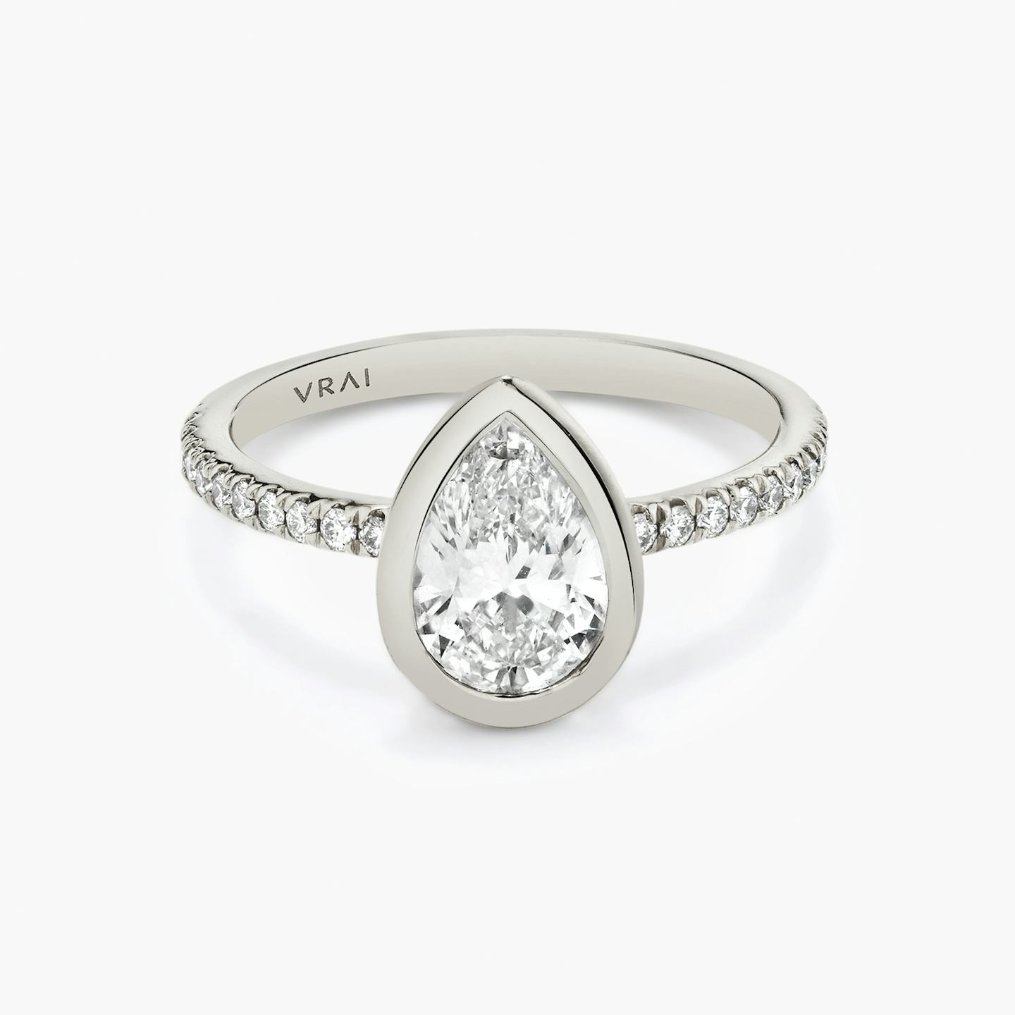Platinum Signature Bezel engagement ring with Pear cut diamond