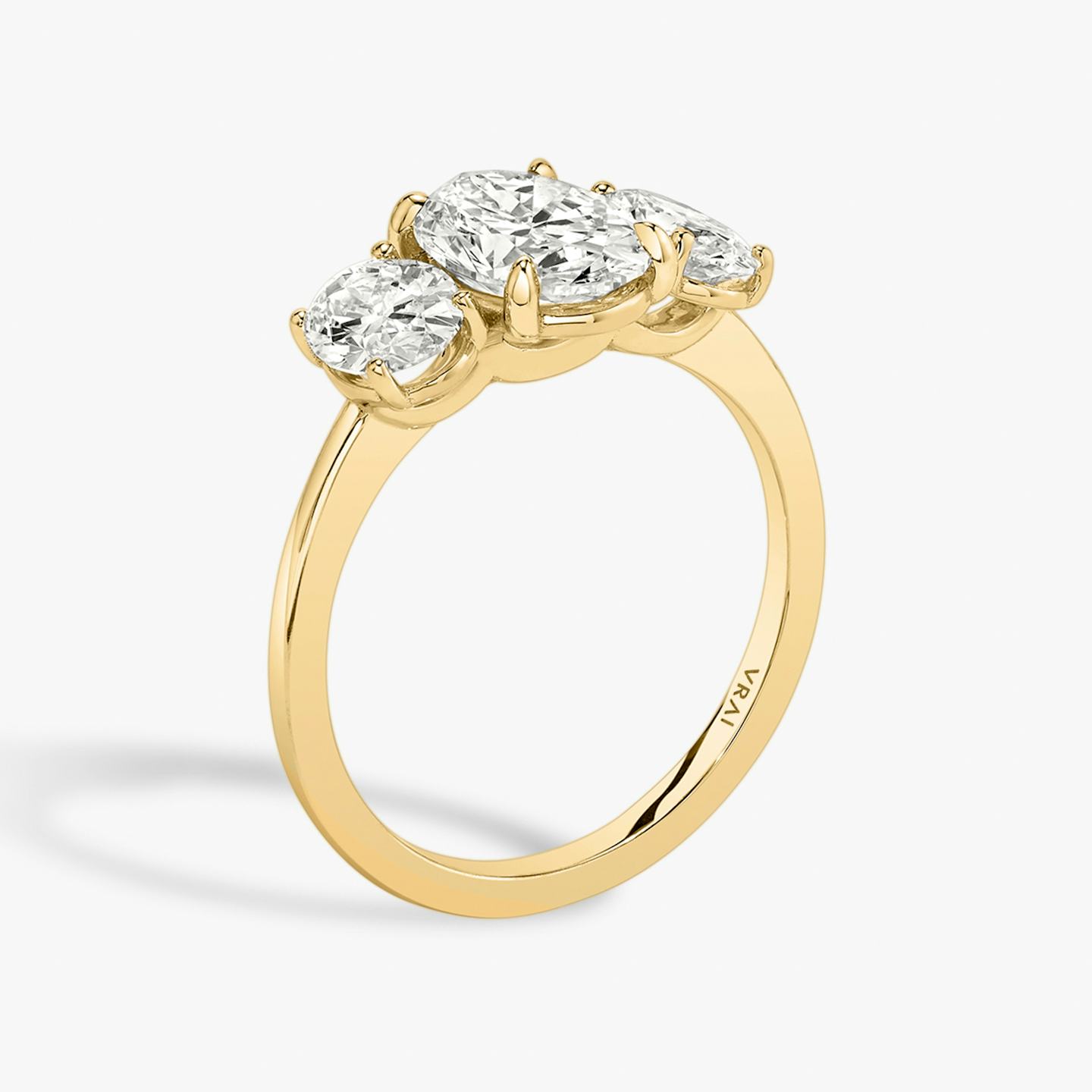 The Three Stone | Oval | 18k | 18k Yellow Gold | Band: Plain | Side stone carat: 1/2 | Side stone shape: Oval | Diamond orientation: vertical | Carat weight: See full inventory