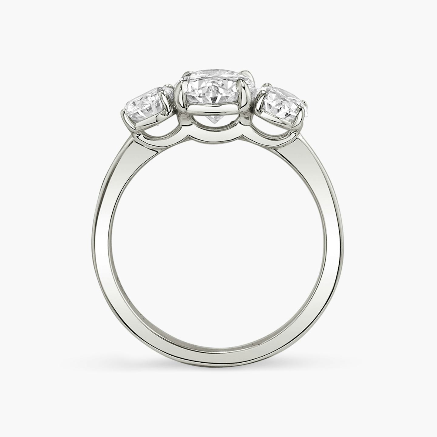 The Three Stone | Oval | Platinum | Band: Plain | Side stone carat: 1/2 | Side stone shape: Oval | Diamond orientation: vertical | Carat weight: See full inventory