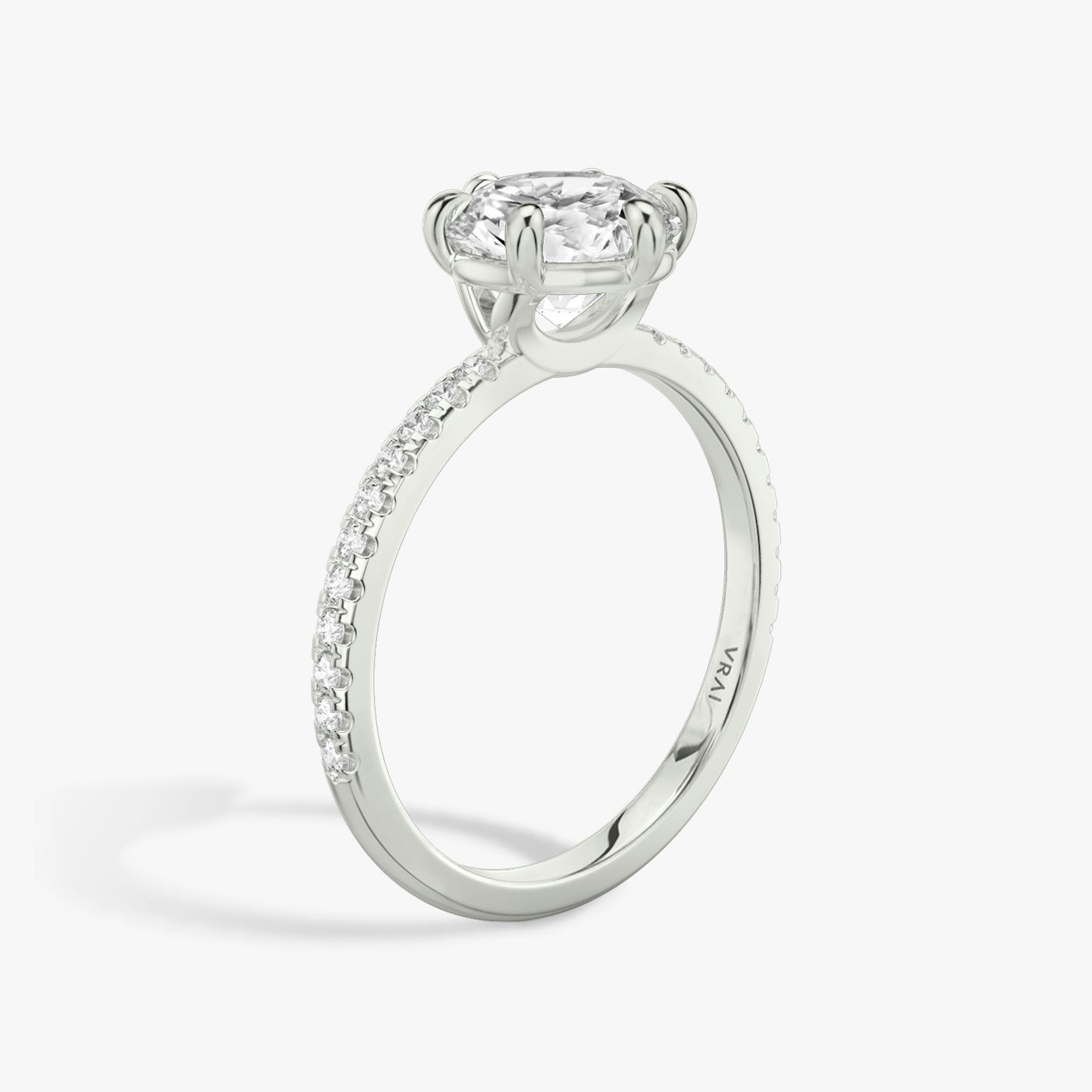 The Signature 6 Prong | Round Brilliant | Platinum | Band: Pavé | Carat weight: See full inventory | Diamond orientation: vertical