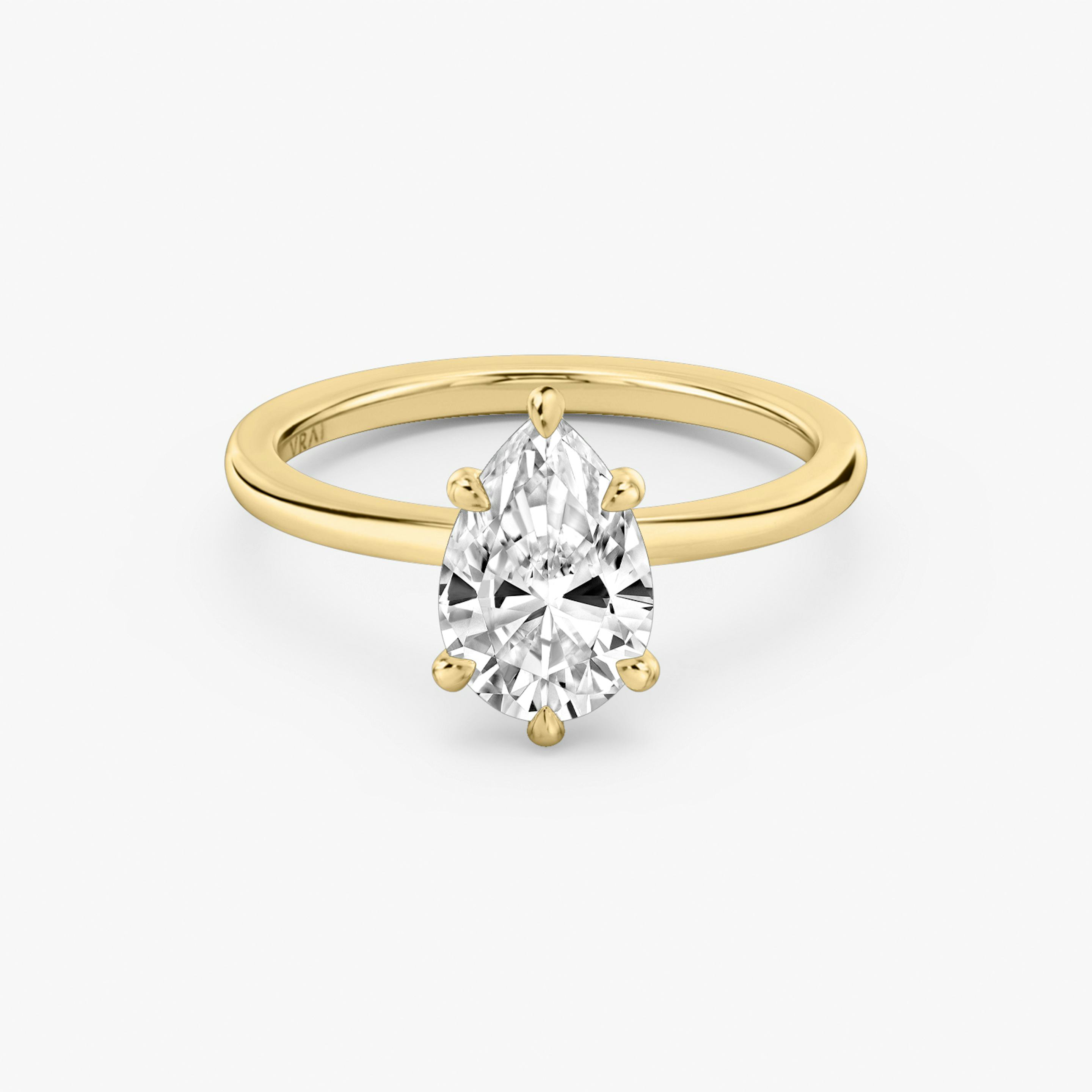 6-Prong Yellow Gold solitaire engagement ring with Pear cut diamond