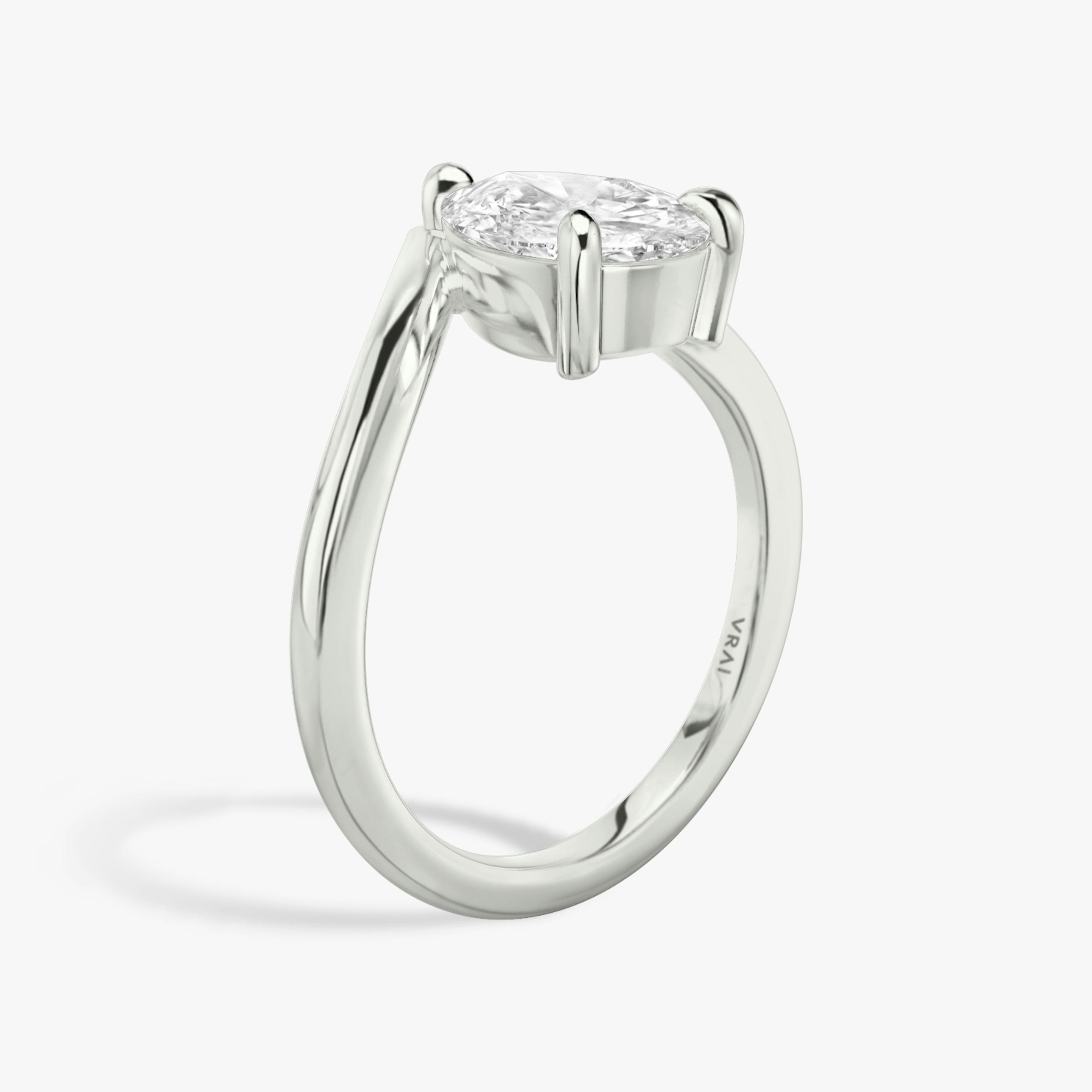 The Signature V | Pear | Platinum | Band: Plain | Diamond orientation: vertical | Carat weight: See full inventory