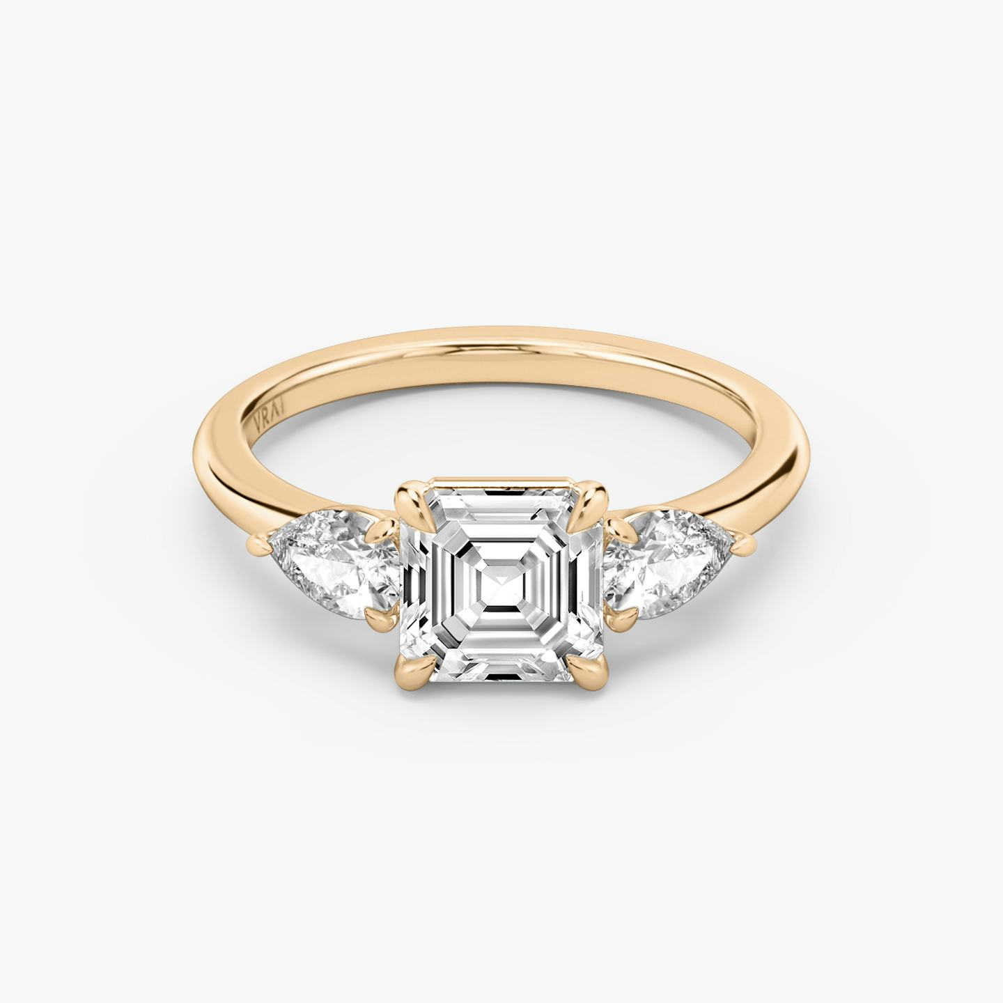 The Three Stone | Asscher | 14k | 14k Rose Gold | Band: Plain | Side stone carat: 1/4 | Side stone shape: Pear | Diamond orientation: vertical | Carat weight: See full inventory
