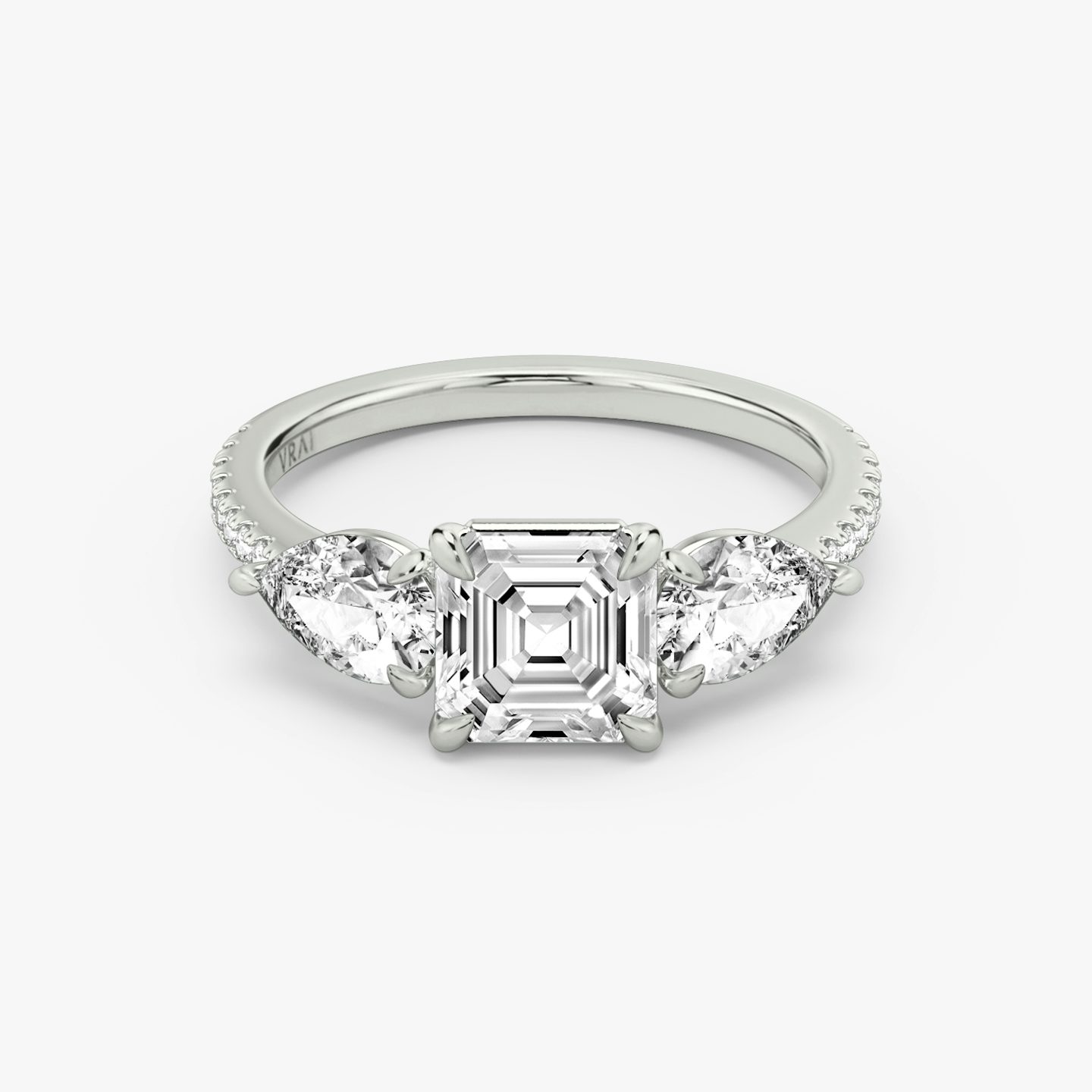 The Three Stone | Asscher | 18k | 18k White Gold | Band: Pavé | Side stone carat: 1/2 | Side stone shape: Pear | Diamond orientation: vertical | Carat weight: See full inventory
