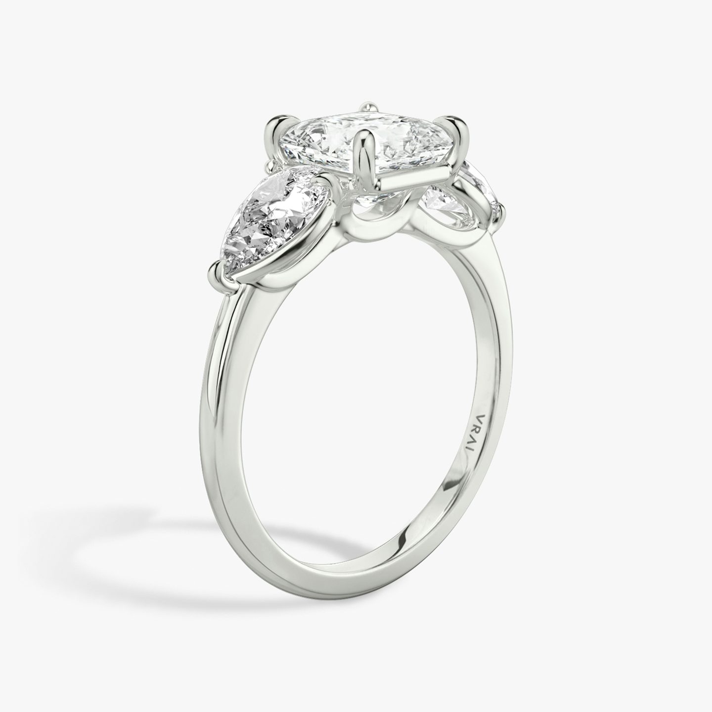 The Three Stone | Asscher | 18k | 18k White Gold | Band: Plain | Side stone carat: 1/2 | Side stone shape: Pear | Diamond orientation: vertical | Carat weight: See full inventory