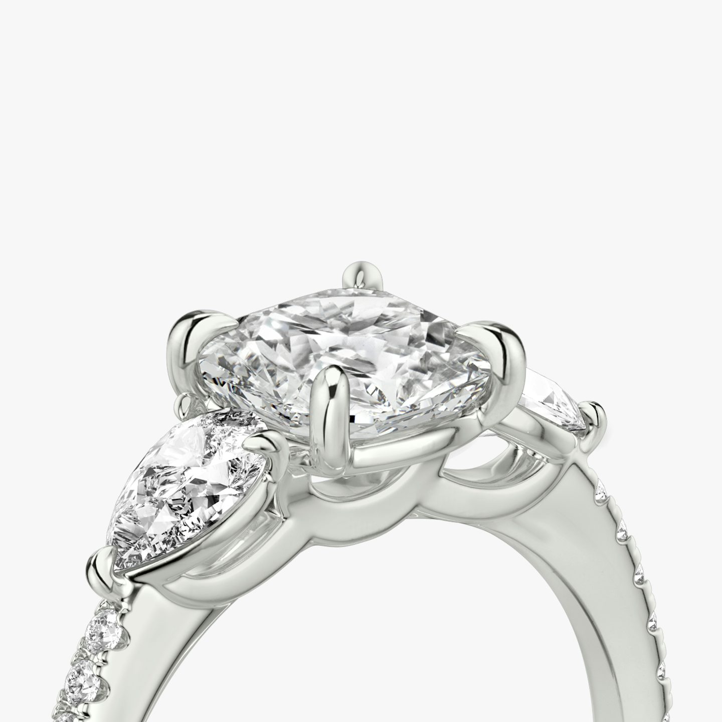 The Three Stone | Pavé Cushion | 18k | 18k White Gold | Band: Pavé | Side stone carat: 1/4 | Side stone shape: Pear | Diamond orientation: vertical | Carat weight: See full inventory