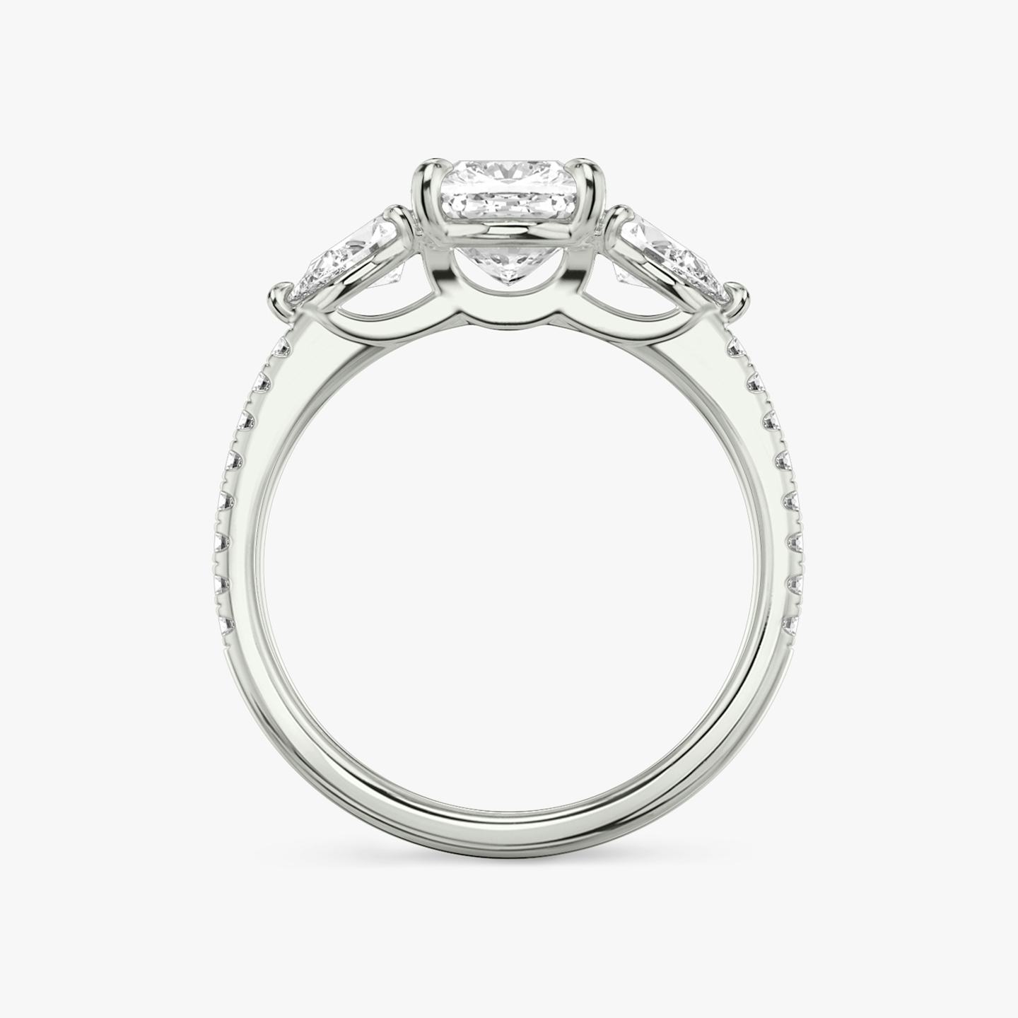 The Three Stone | Pavé Cushion | Platinum | Band: Pavé | Side stone carat: 1/4 | Side stone shape: Pear | Diamond orientation: vertical | Carat weight: See full inventory