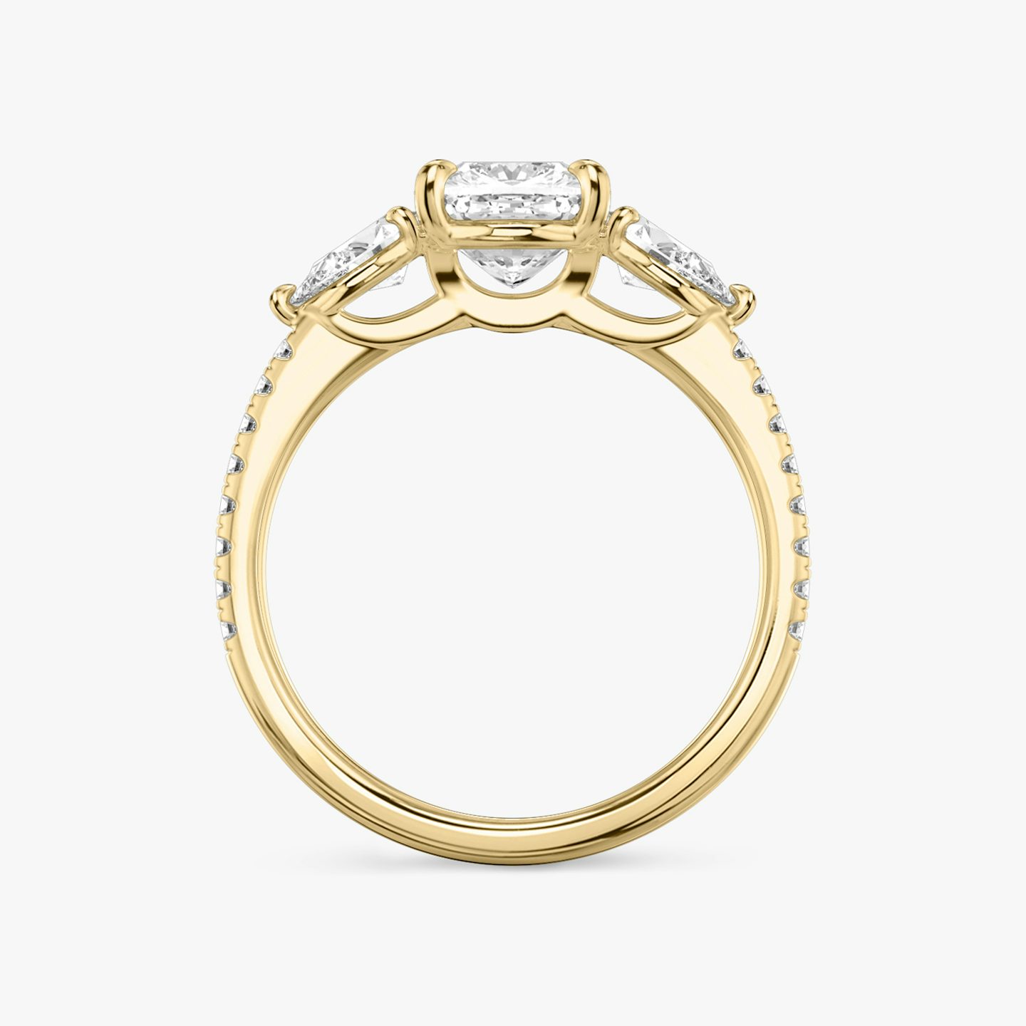 The Three Stone | Pavé Cushion | 18k | 18k Yellow Gold | Band: Pavé | Side stone carat: 1/4 | Side stone shape: Pear | Diamond orientation: vertical | Carat weight: See full inventory