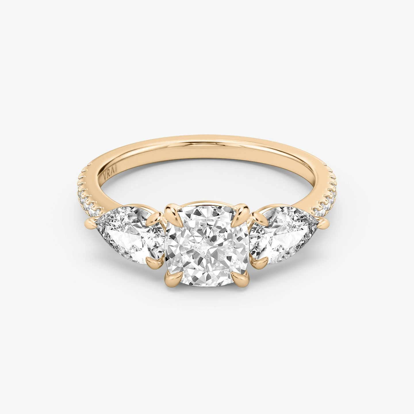 The Three Stone | Pavé Cushion | 14k | 14k Rose Gold | Band: Pavé | Side stone carat: 1/2 | Side stone shape: Pear | Diamond orientation: vertical | Carat weight: See full inventory