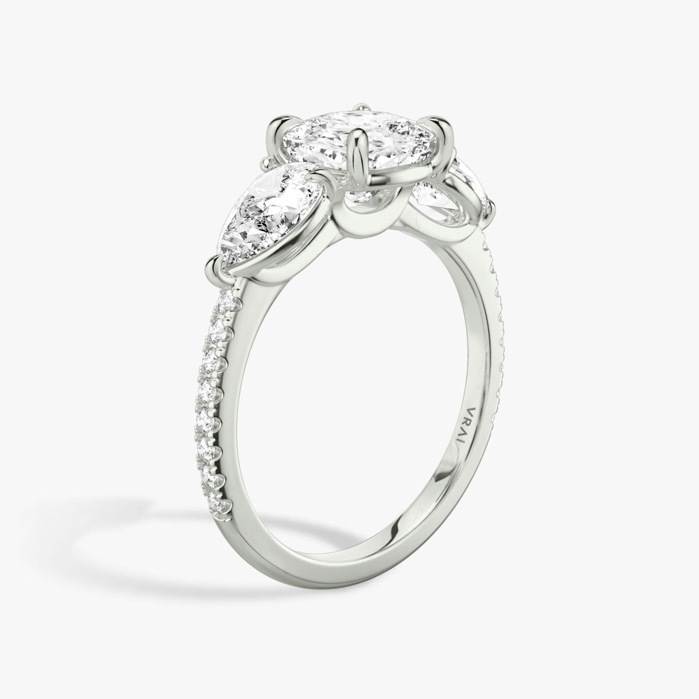 The Three Stone | Pavé Cushion | 18k | 18k White Gold | Band: Pavé | Side stone carat: 1/2 | Side stone shape: Pear | Diamond orientation: vertical | Carat weight: See full inventory