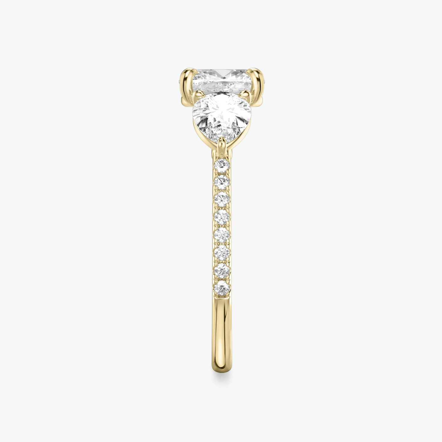 The Three Stone | Pavé Cushion | 18k | 18k Yellow Gold | Band: Pavé | Side stone carat: 1/2 | Side stone shape: Pear | Diamond orientation: vertical | Carat weight: See full inventory