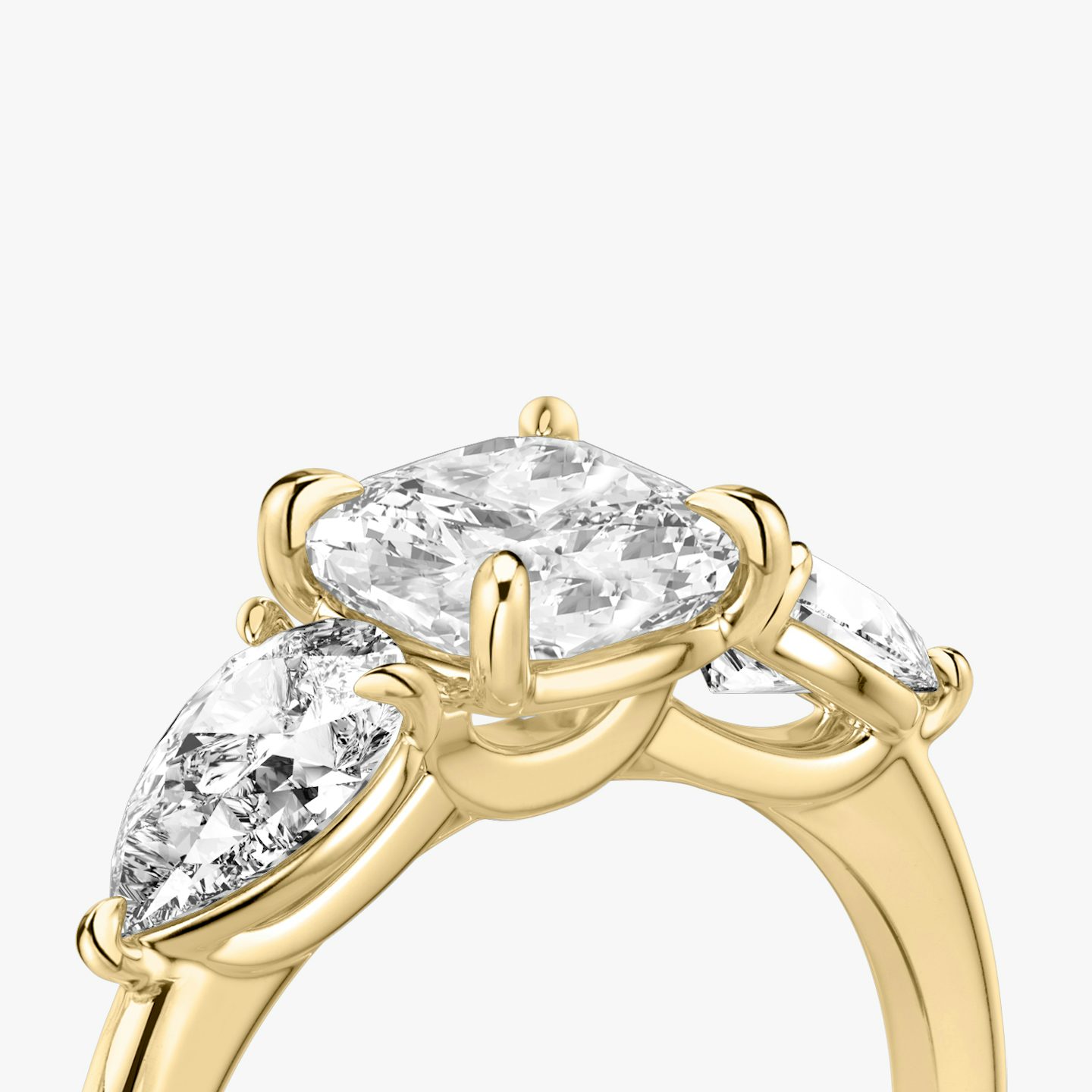 The Three Stone | Pavé Cushion | 18k | 18k Yellow Gold | Band: Plain | Side stone carat: 1/2 | Side stone shape: Pear | Diamond orientation: vertical | Carat weight: See full inventory