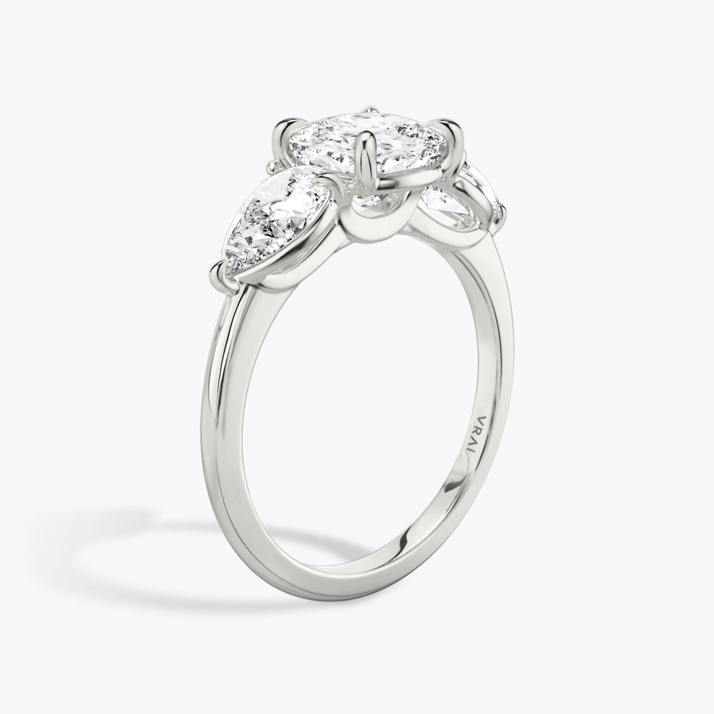 The Three Stone | Pavé Cushion | 18k | 18k White Gold | Band: Plain | Side stone carat: 1/2 | Side stone shape: Pear | Diamond orientation: vertical | Carat weight: See full inventory