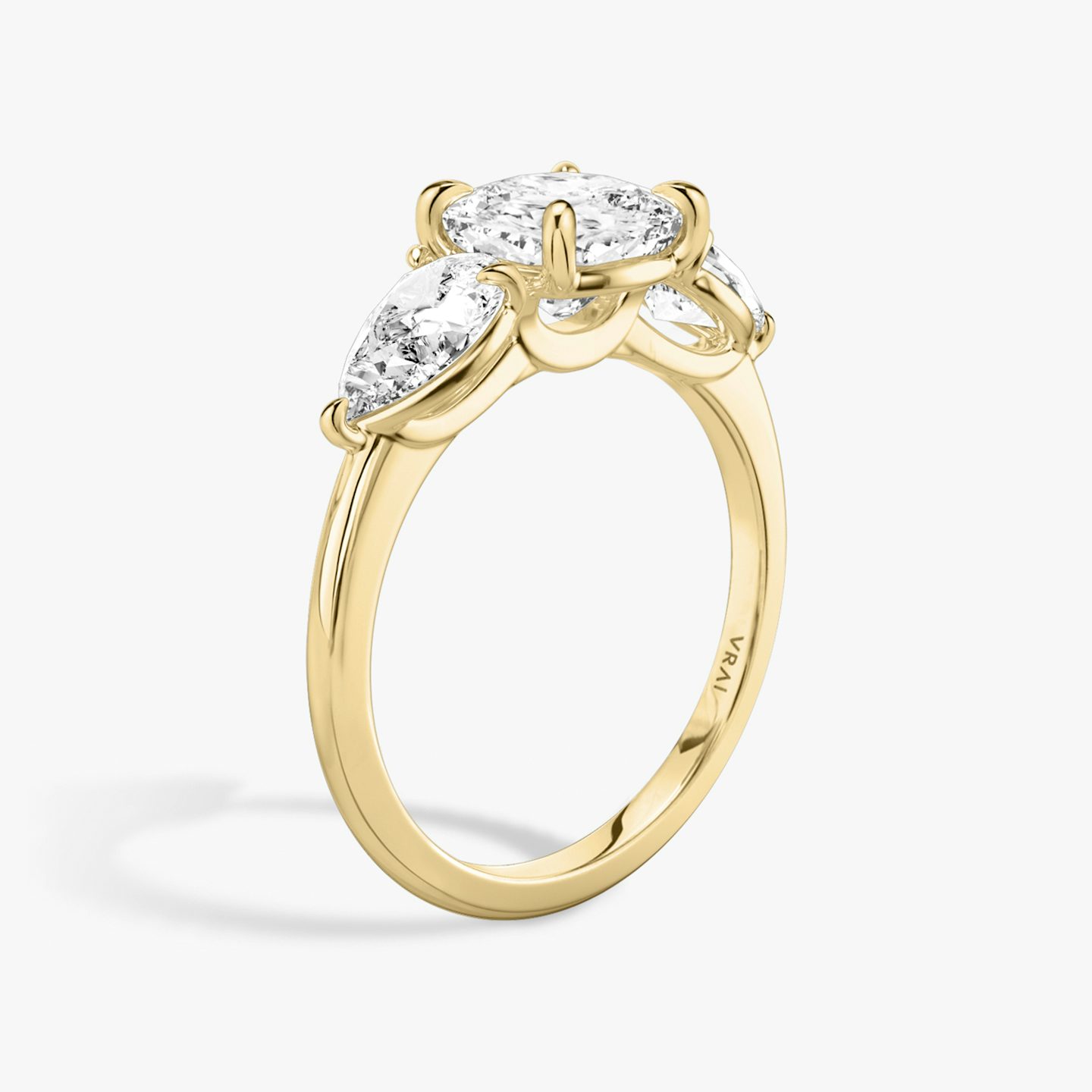 The Three Stone | Pavé Cushion | 18k | 18k Yellow Gold | Band: Plain | Side stone carat: 1/2 | Side stone shape: Pear | Diamond orientation: vertical | Carat weight: See full inventory