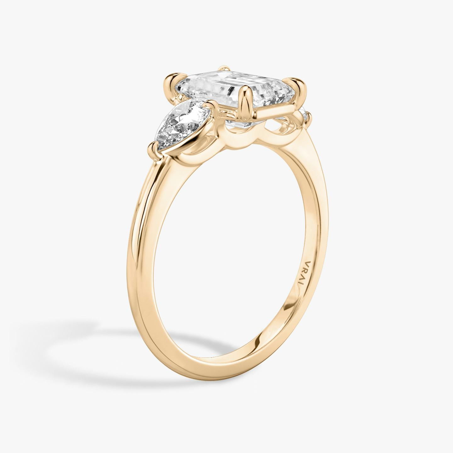 The Three Stone | Emerald | 14k | 14k Rose Gold | Band: Plain | Side stone carat: 1/4 | Side stone shape: Pear | Diamond orientation: vertical | Carat weight: See full inventory