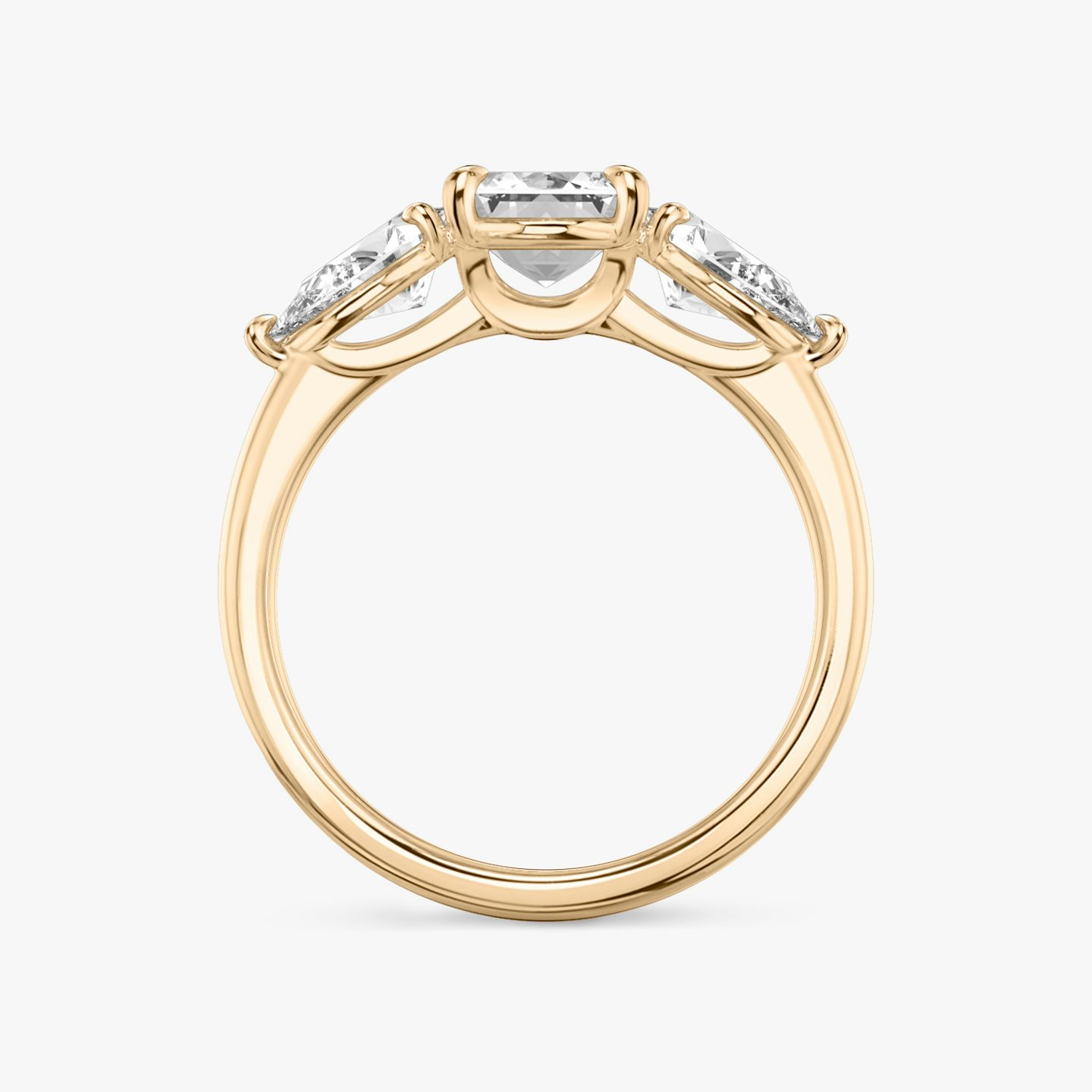 The Three Stone | Emerald | 14k | 14k Rose Gold | Band: Plain | Side stone carat: 1/2 | Side stone shape: Pear | Diamond orientation: vertical | Carat weight: See full inventory