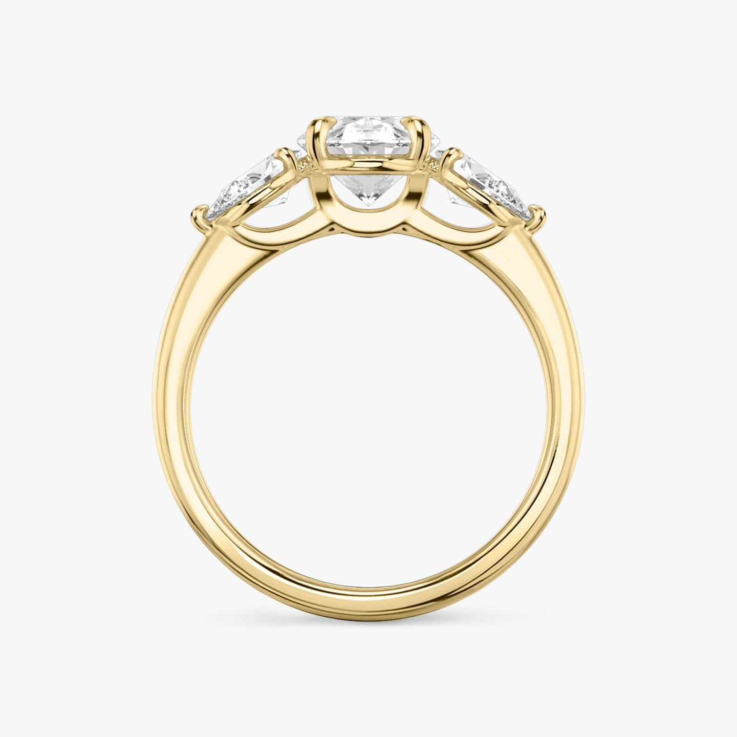 The Three Stone | Oval | 18k | 18k Yellow Gold | Band: Plain | Side stone carat: 1/4 | Side stone shape: Pear | Diamond orientation: vertical | Carat weight: See full inventory