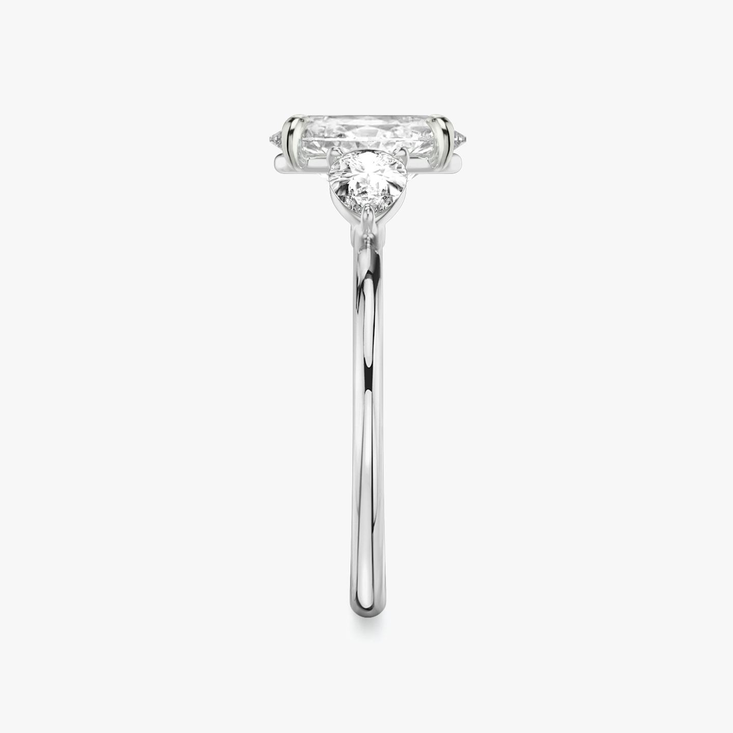 The Three Stone | Oval | 18k | 18k White Gold | Band: Plain | Side stone carat: 1/4 | Side stone shape: Pear | Diamond orientation: vertical | Carat weight: See full inventory