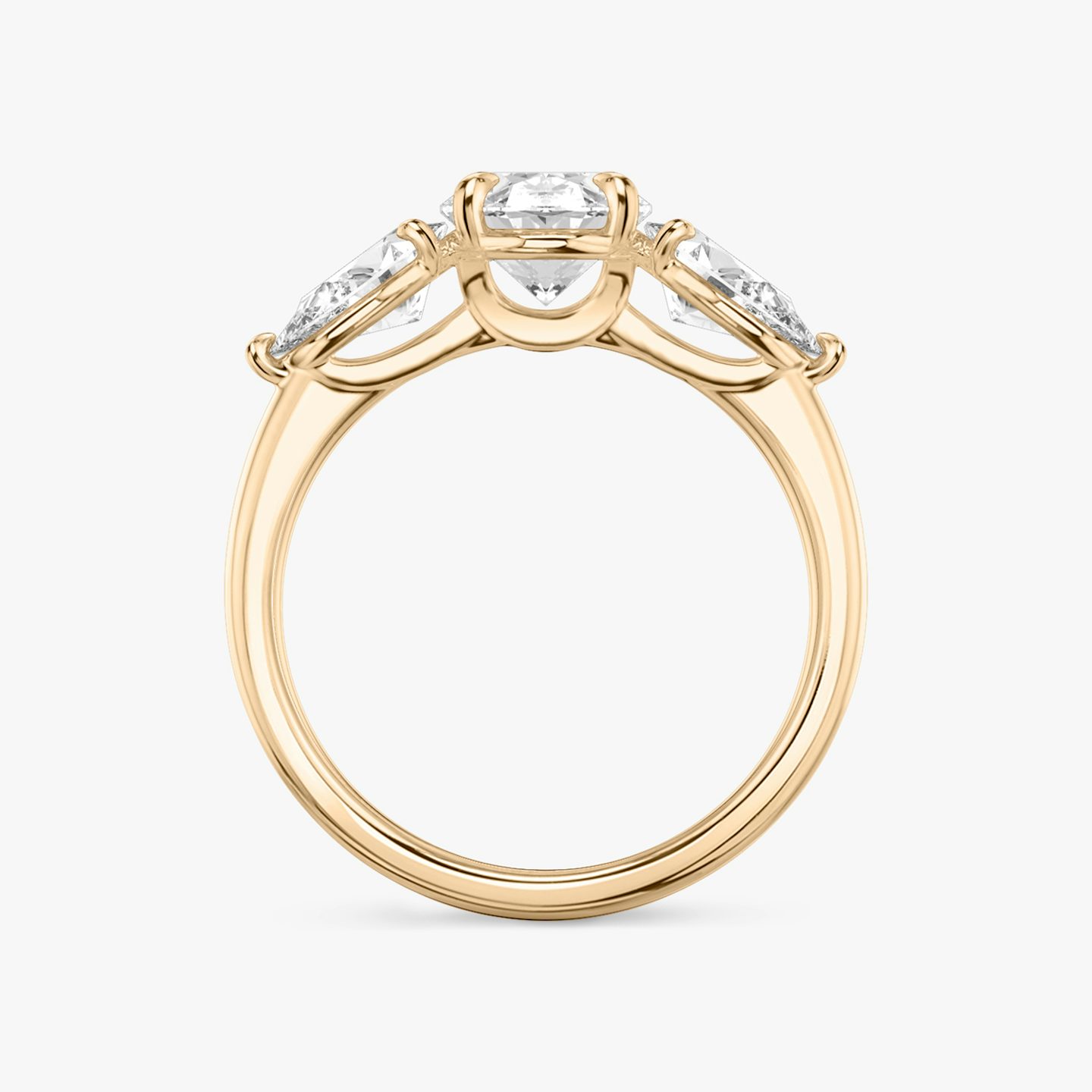 The Three Stone | Oval | 14k | 14k Rose Gold | Band: Plain | Side stone carat: 1/2 | Side stone shape: Pear | Diamond orientation: vertical | Carat weight: See full inventory