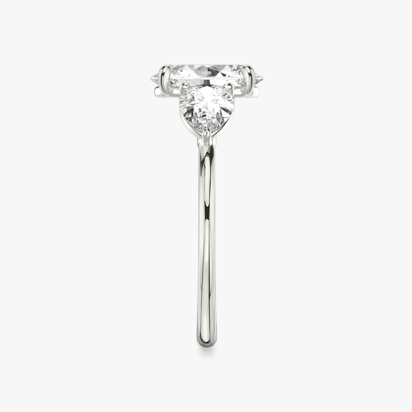 The Three Stone | Oval | Platinum | Band: Plain | Side stone carat: 1/2 | Side stone shape: Pear | Diamond orientation: vertical | Carat weight: See full inventory