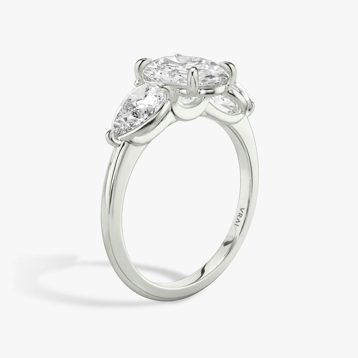 The Three Stone | Oval | Platinum | Band: Plain | Side stone carat: 1/2 | Side stone shape: Pear | Diamond orientation: vertical | Carat weight: See full inventory