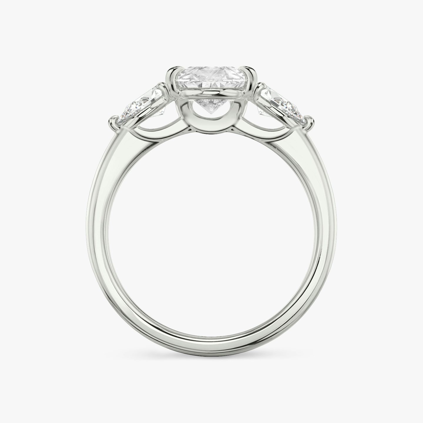 The Three Stone | Pear | 18k | 18k White Gold | Band: Plain | Side stone carat: 1/4 | Side stone shape: Pear | Diamond orientation: vertical | Carat weight: See full inventory