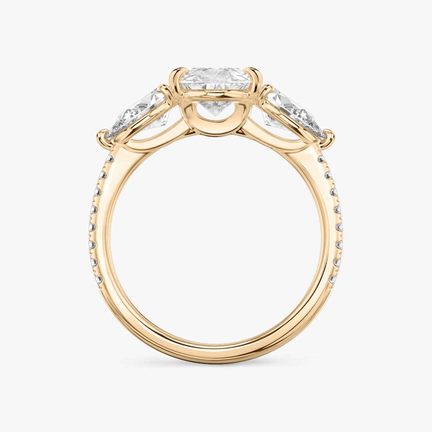 The Three Stone | Pear | 14k | 14k Rose Gold | Band: Pavé | Side stone carat: 1/2 | Side stone shape: Pear | Diamond orientation: vertical | Carat weight: See full inventory