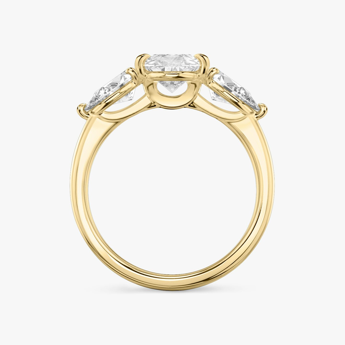 The Three Stone | Pear | 18k | 18k Yellow Gold | Band: Plain | Side stone carat: 1/2 | Side stone shape: Pear | Diamond orientation: vertical | Carat weight: See full inventory