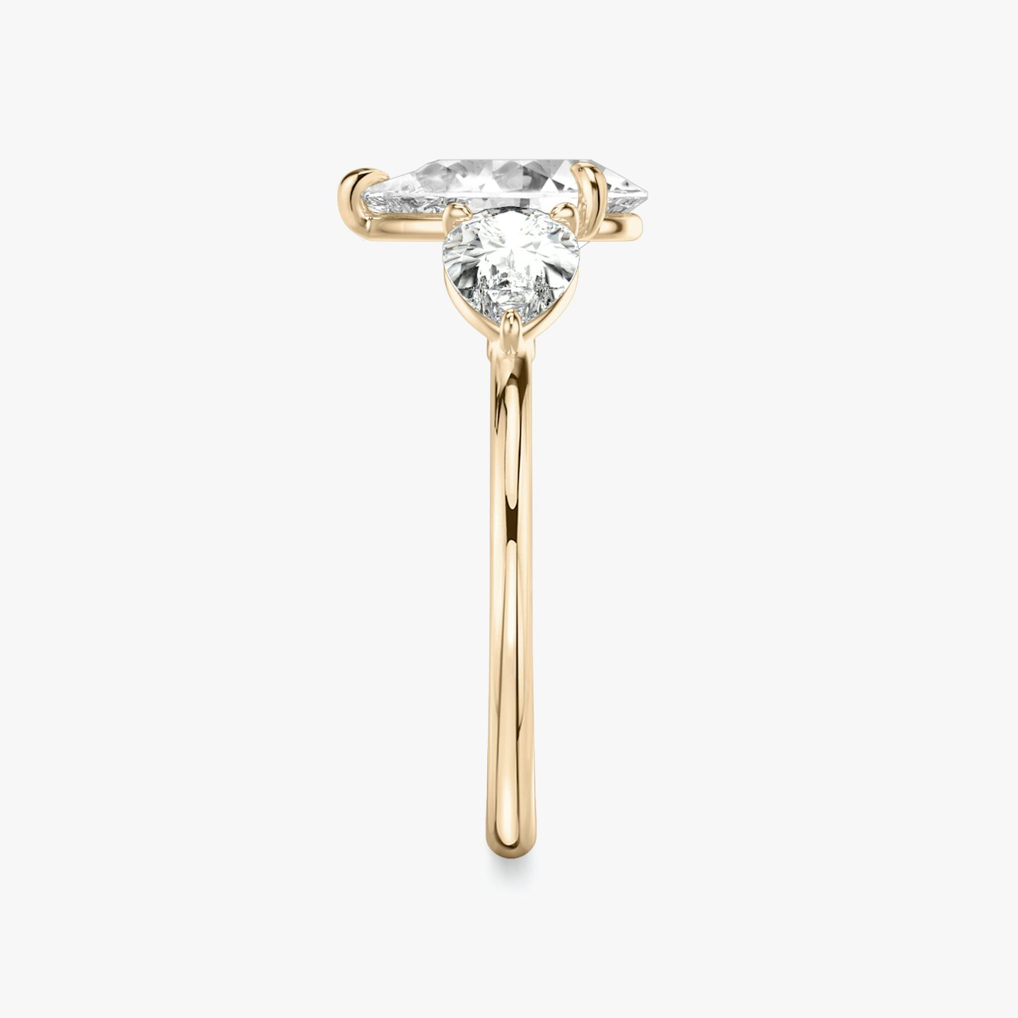 The Three Stone | Pear | 14k | 14k Rose Gold | Band: Plain | Side stone carat: 1/2 | Side stone shape: Pear | Diamond orientation: vertical | Carat weight: See full inventory