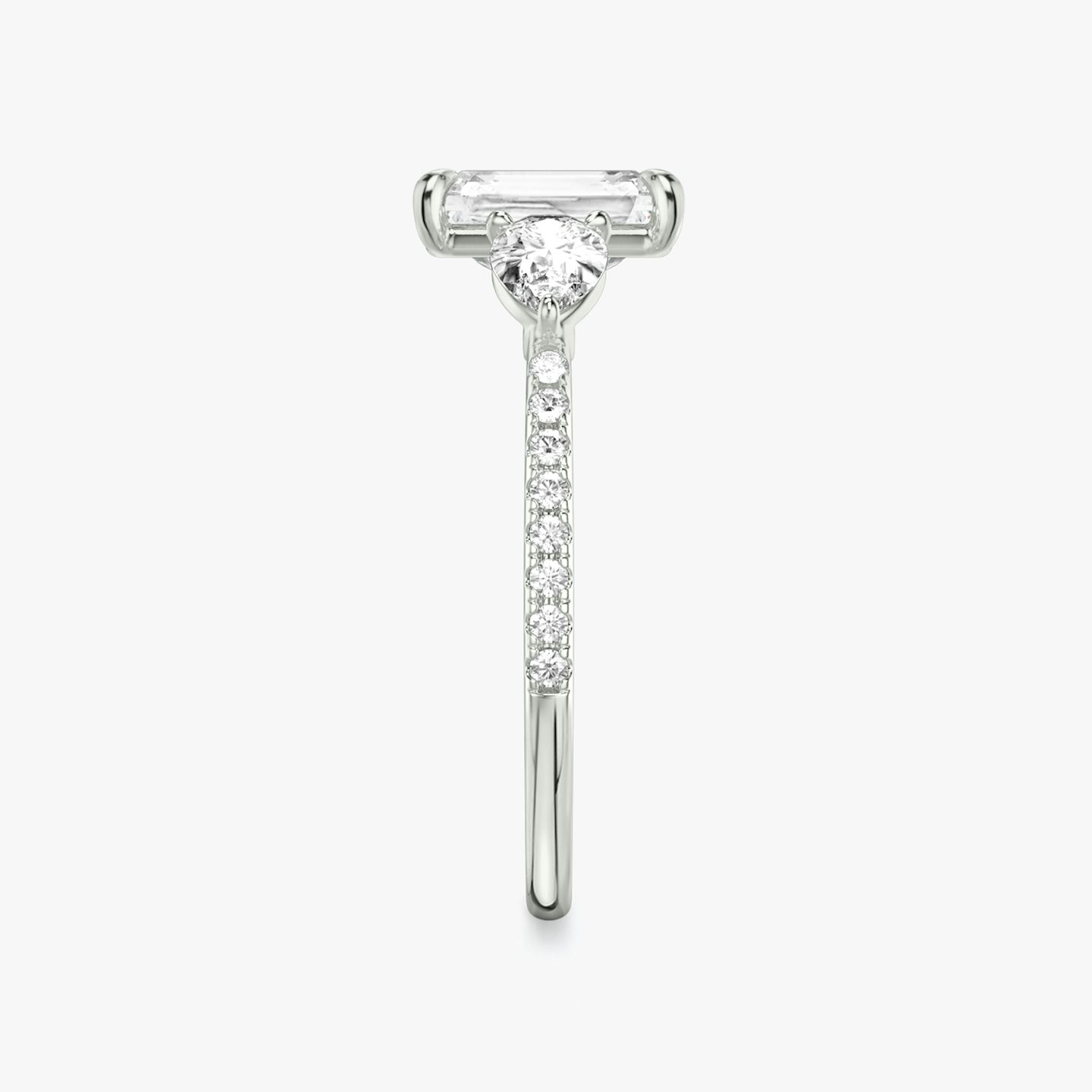 The Three Stone | Radiant | 18k | 18k White Gold | Band: Pavé | Side stone carat: 1/4 | Side stone shape: Pear | Diamond orientation: vertical | Carat weight: See full inventory
