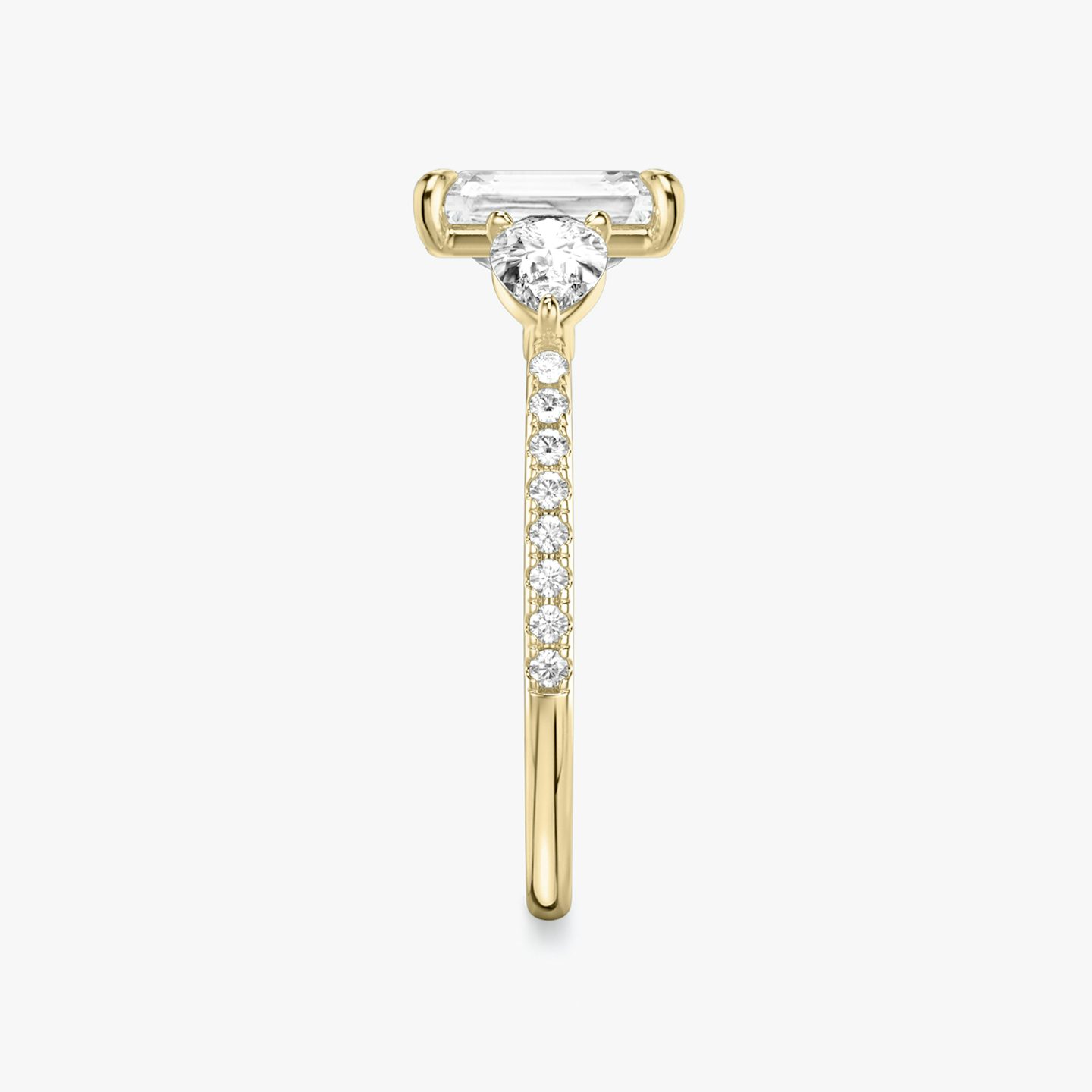 The Three Stone | Radiant | 18k | 18k Yellow Gold | Band: Pavé | Side stone carat: 1/4 | Side stone shape: Pear | Diamond orientation: vertical | Carat weight: See full inventory