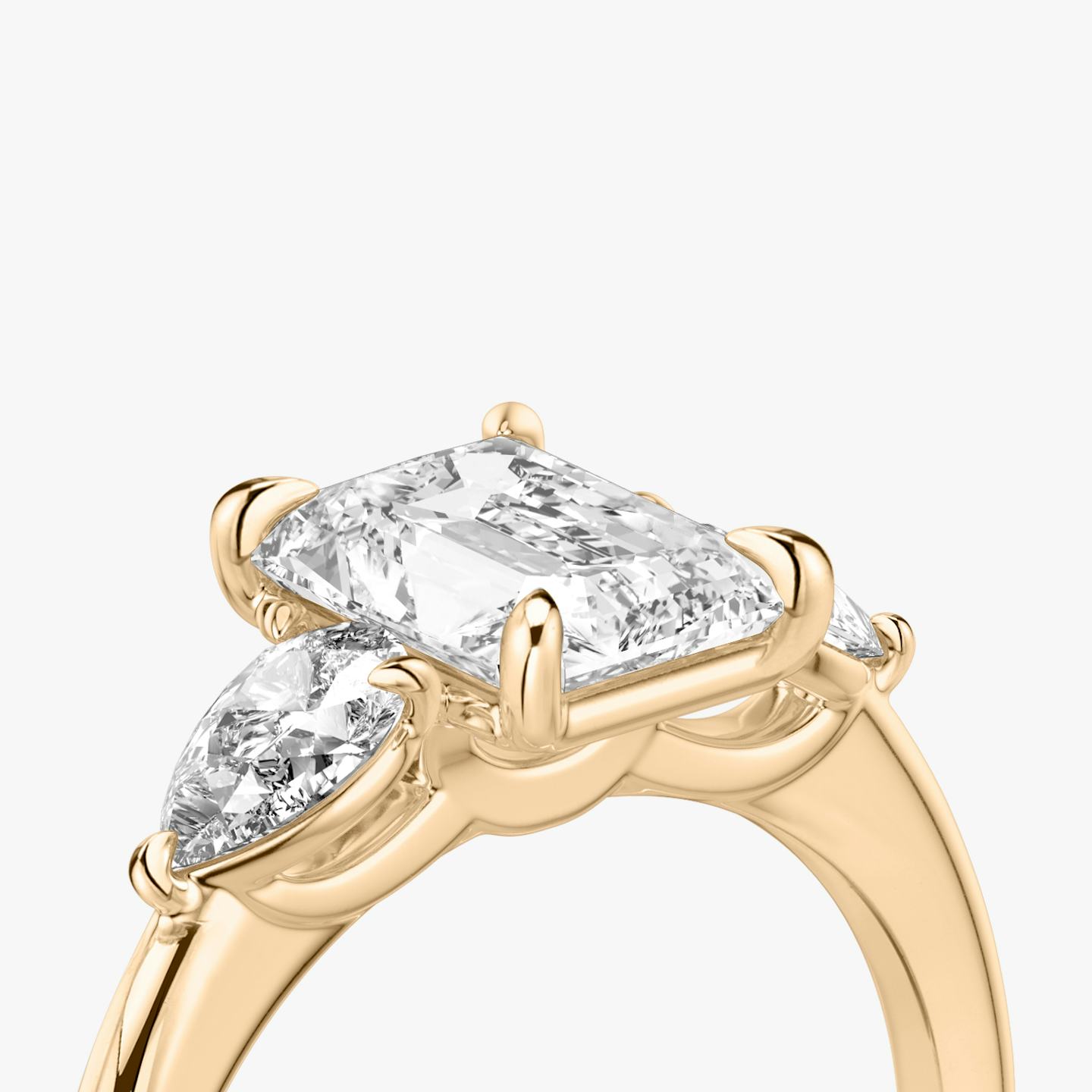 The Three Stone | Radiant | 14k | 14k Rose Gold | Band: Plain | Side stone carat: 1/4 | Side stone shape: Pear | Diamond orientation: vertical | Carat weight: See full inventory