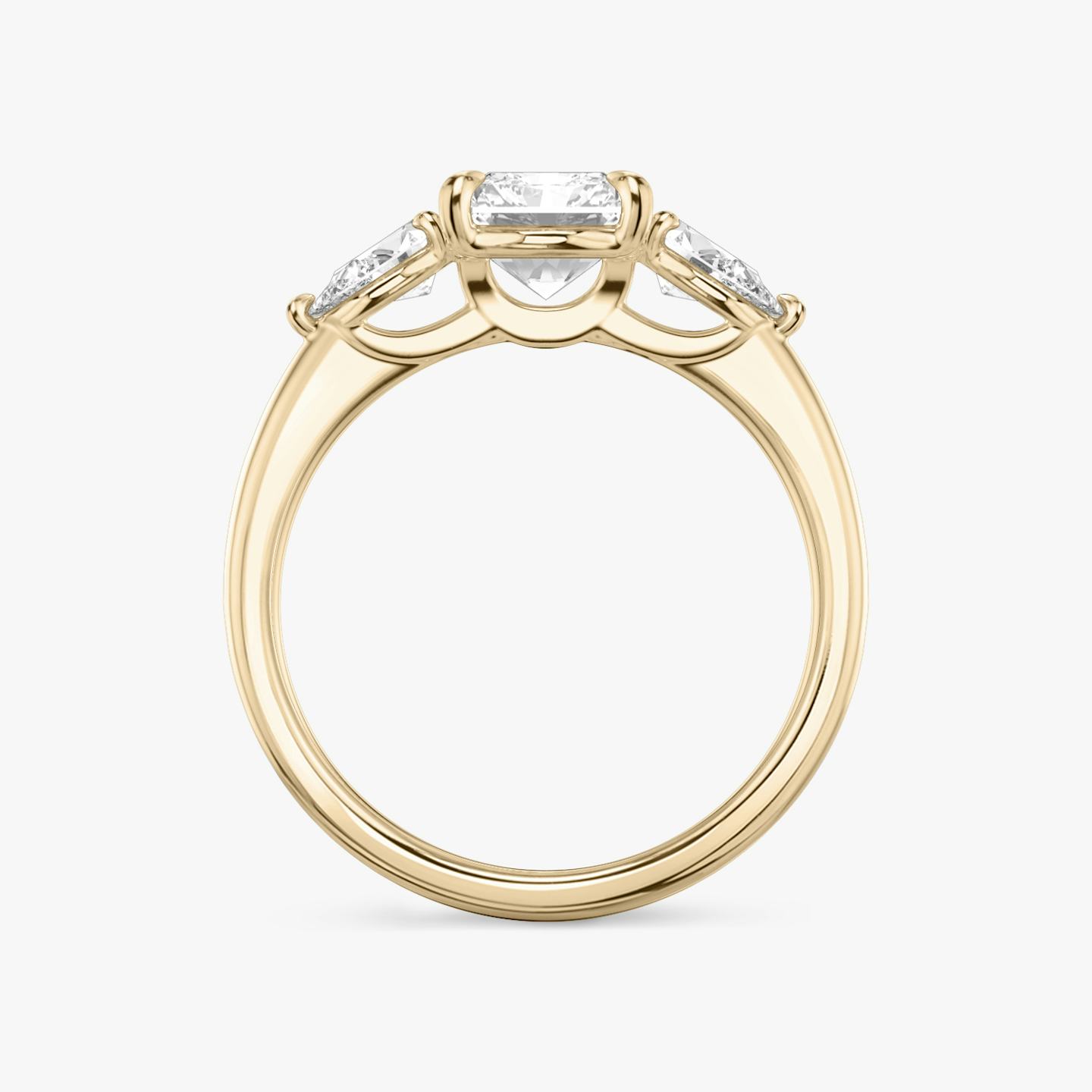 The Three Stone | Radiant | 14k | 14k Rose Gold | Band: Plain | Side stone carat: 1/4 | Side stone shape: Pear | Diamond orientation: vertical | Carat weight: See full inventory
