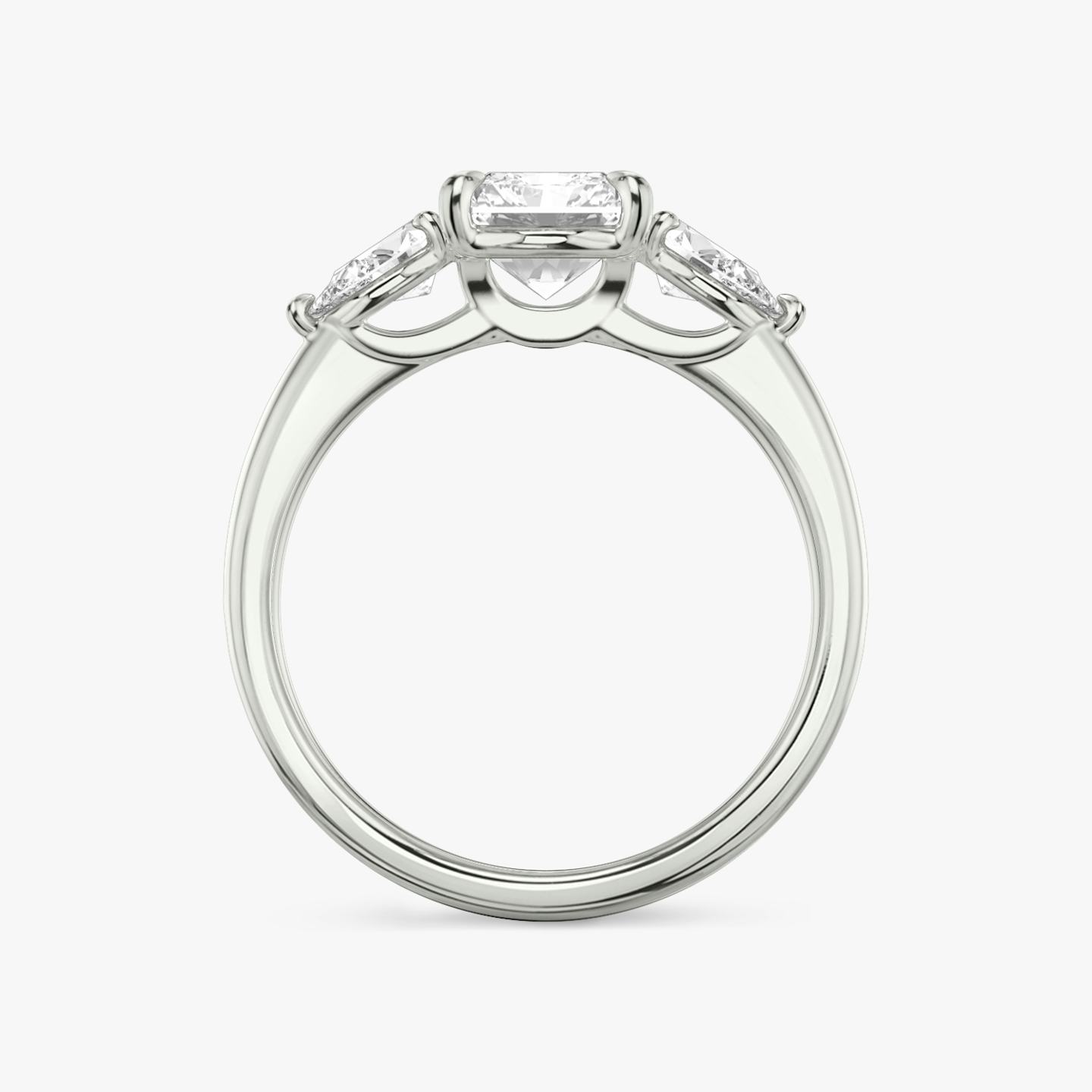 The Three Stone | Radiant | 18k | 18k White Gold | Band: Plain | Side stone carat: 1/4 | Side stone shape: Pear | Diamond orientation: vertical | Carat weight: See full inventory