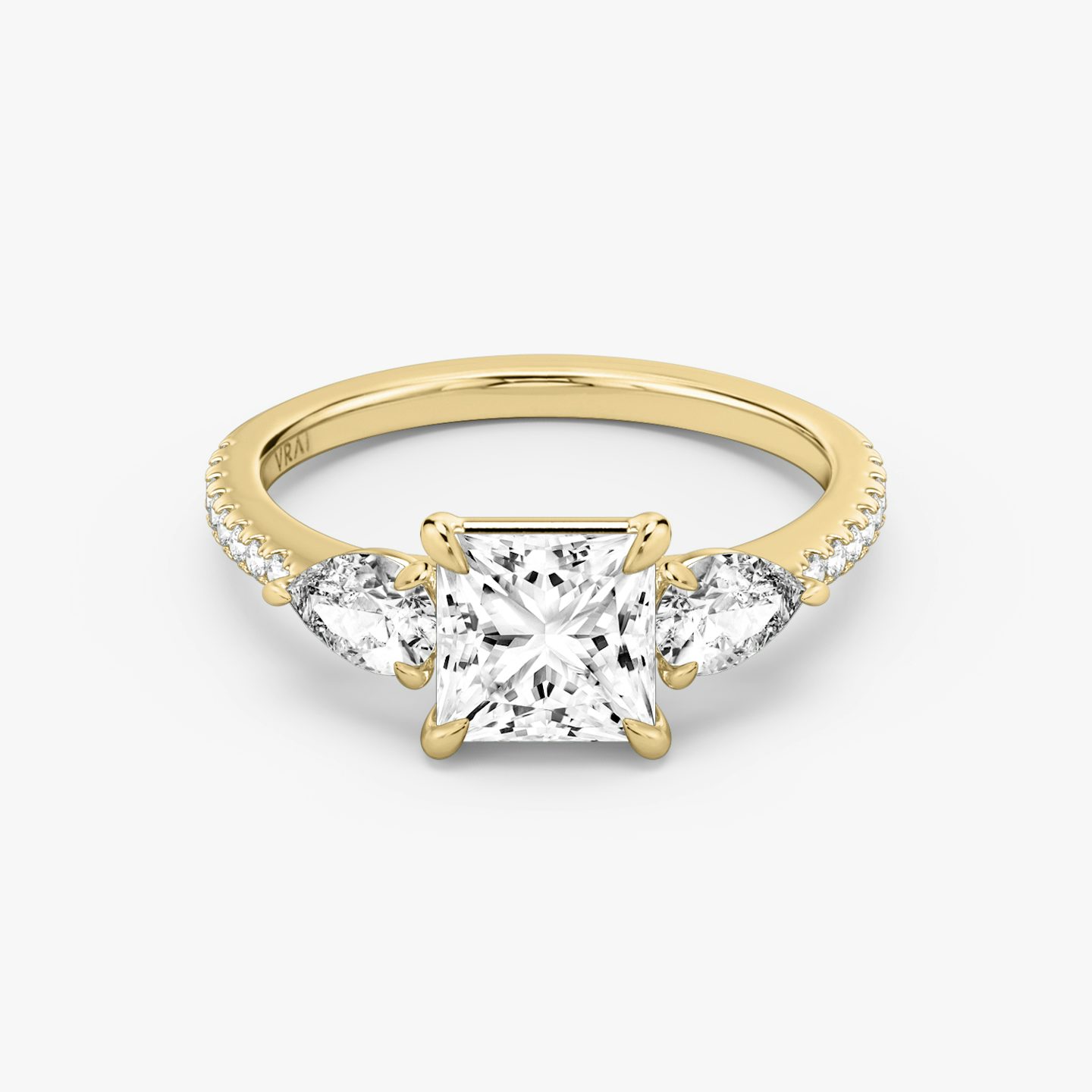 The Three Stone | Princess | 18k | 18k Yellow Gold | Band: Pavé | Side stone carat: 1/4 | Side stone shape: Pear | Diamond orientation: vertical | Carat weight: See full inventory