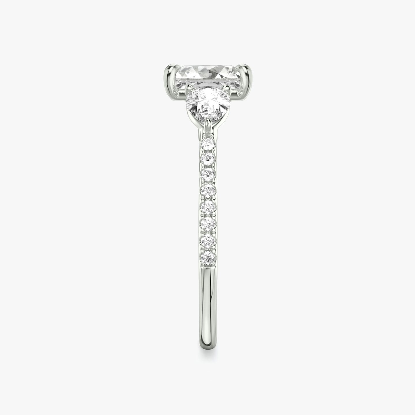 The Three Stone | Princess | Platinum | Band: Pavé | Side stone carat: 1/4 | Side stone shape: Pear | Diamond orientation: vertical | Carat weight: See full inventory