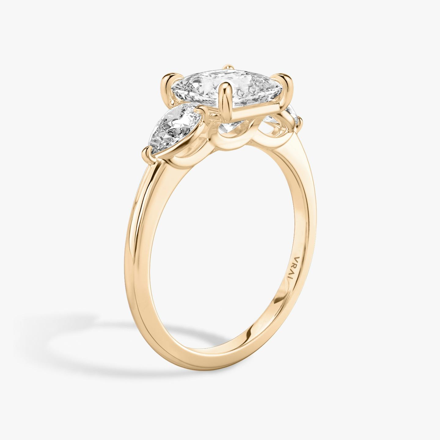 The Three Stone | Princess | 14k | 14k Rose Gold | Band: Plain | Side stone carat: 1/4 | Side stone shape: Pear | Diamond orientation: vertical | Carat weight: See full inventory