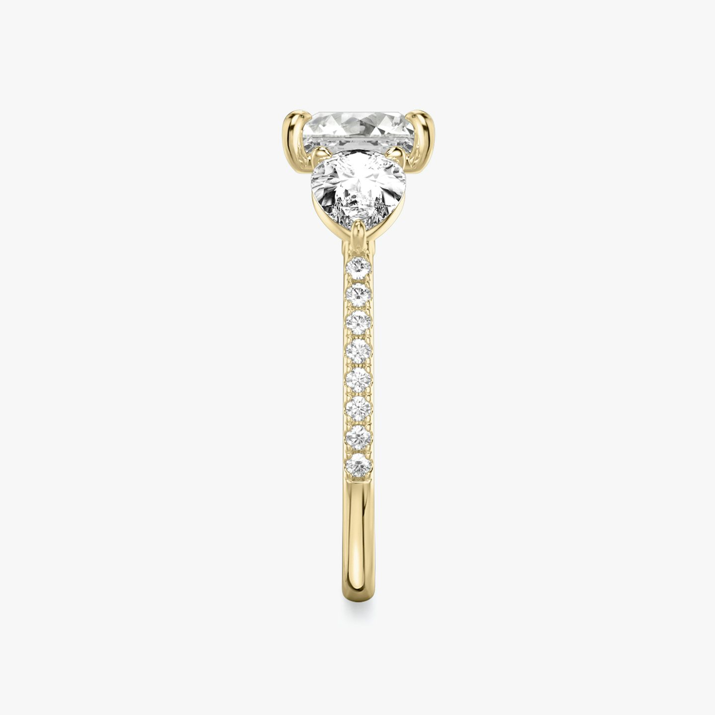 The Three Stone | Princess | 18k | 18k Yellow Gold | Band: Pavé | Side stone carat: 1/2 | Side stone shape: Pear | Diamond orientation: vertical | Carat weight: See full inventory