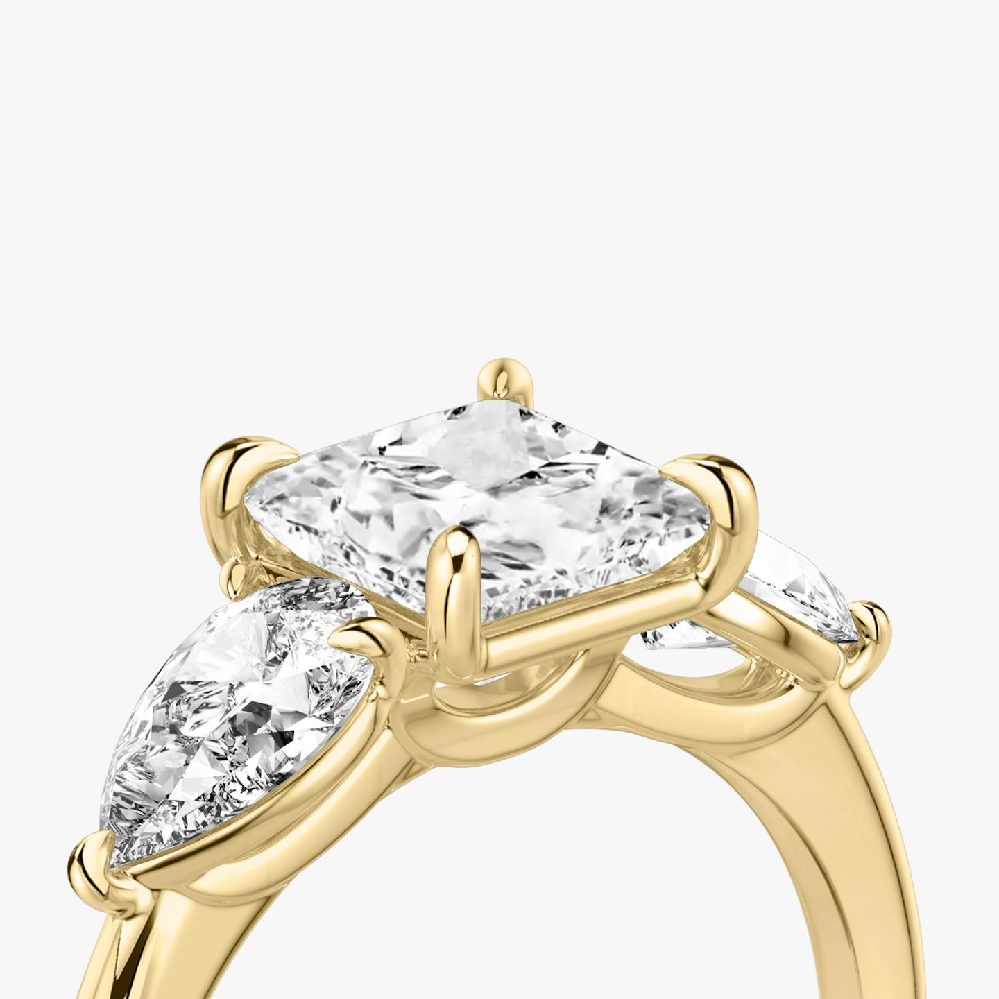 The Three Stone | Princess | 18k | 18k Yellow Gold | Band: Plain | Side stone carat: 1/2 | Side stone shape: Pear | Diamond orientation: vertical | Carat weight: See full inventory