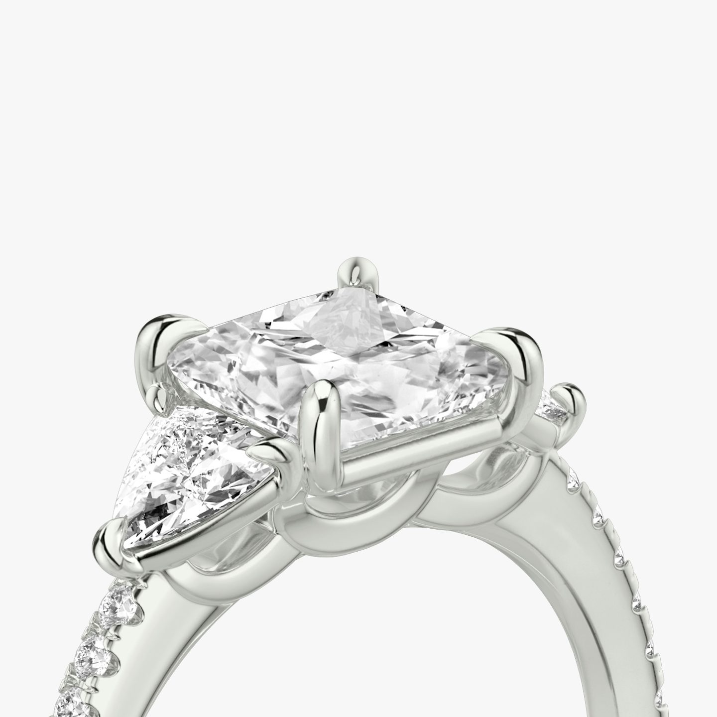 The Three Stone | Princess | 18k | 18k White Gold | Band: Pavé | Side stone carat: 1/4 | Side stone shape: Trillion | Diamond orientation: vertical | Carat weight: See full inventory