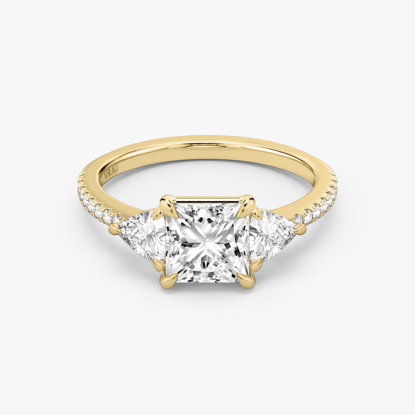 The Three Stone | Princess | 18k | 18k Yellow Gold | Band: Pavé | Side stone carat: 1/4 | Side stone shape: Trillion | Diamond orientation: vertical | Carat weight: See full inventory