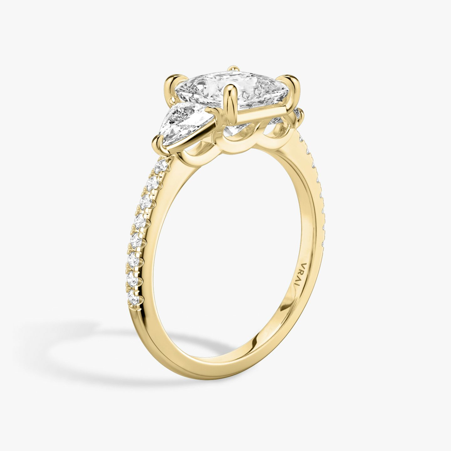 The Three Stone | Princess | 18k | 18k Yellow Gold | Band: Pavé | Side stone carat: 1/4 | Side stone shape: Trillion | Diamond orientation: vertical | Carat weight: See full inventory