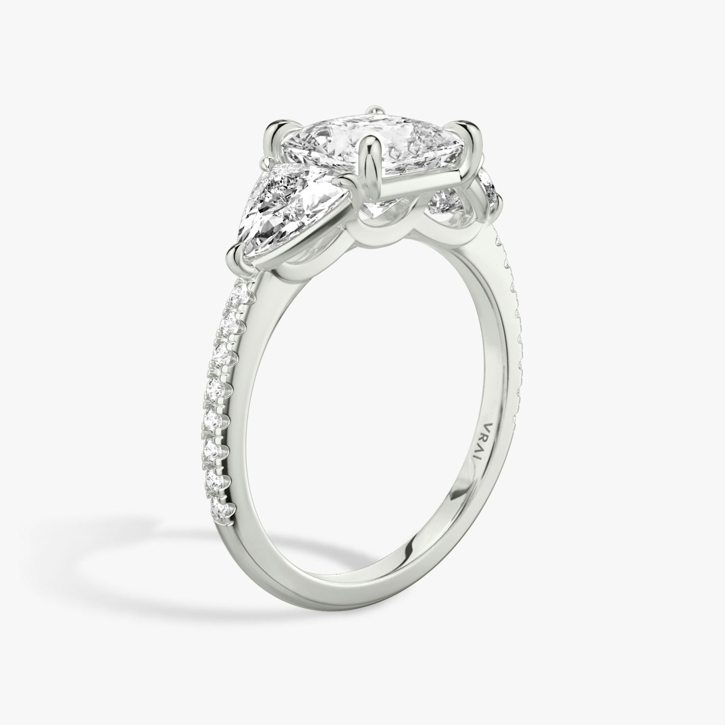 The Three Stone | Princess | 18k | 18k White Gold | Band: Pavé | Side stone carat: 1/2 | Side stone shape: Trillion | Diamond orientation: vertical | Carat weight: See full inventory