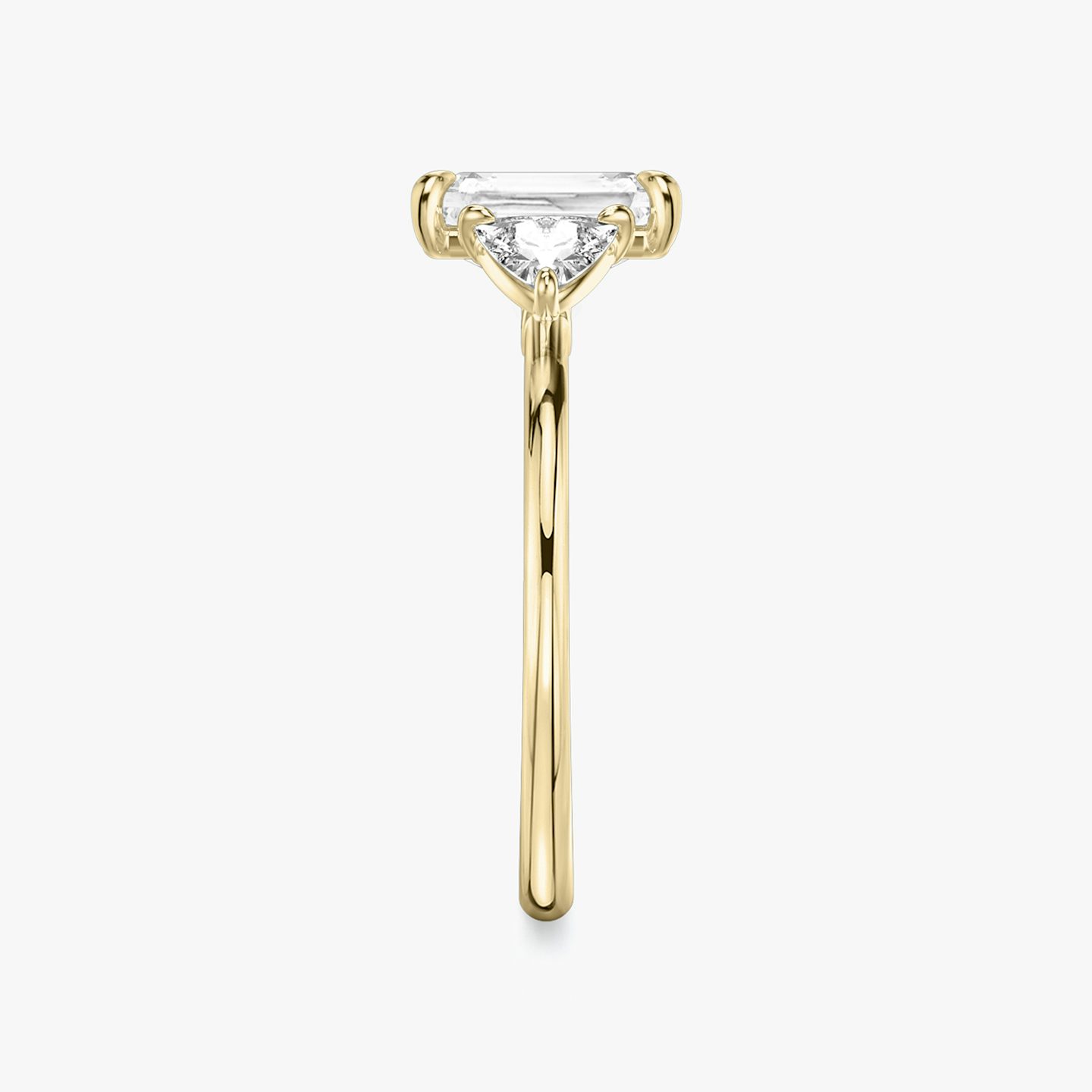 The Three Stone | Radiant | 18k | 18k Yellow Gold | Band: Plain | Side stone carat: 1/4 | Side stone shape: Trillion | Diamond orientation: vertical | Carat weight: See full inventory