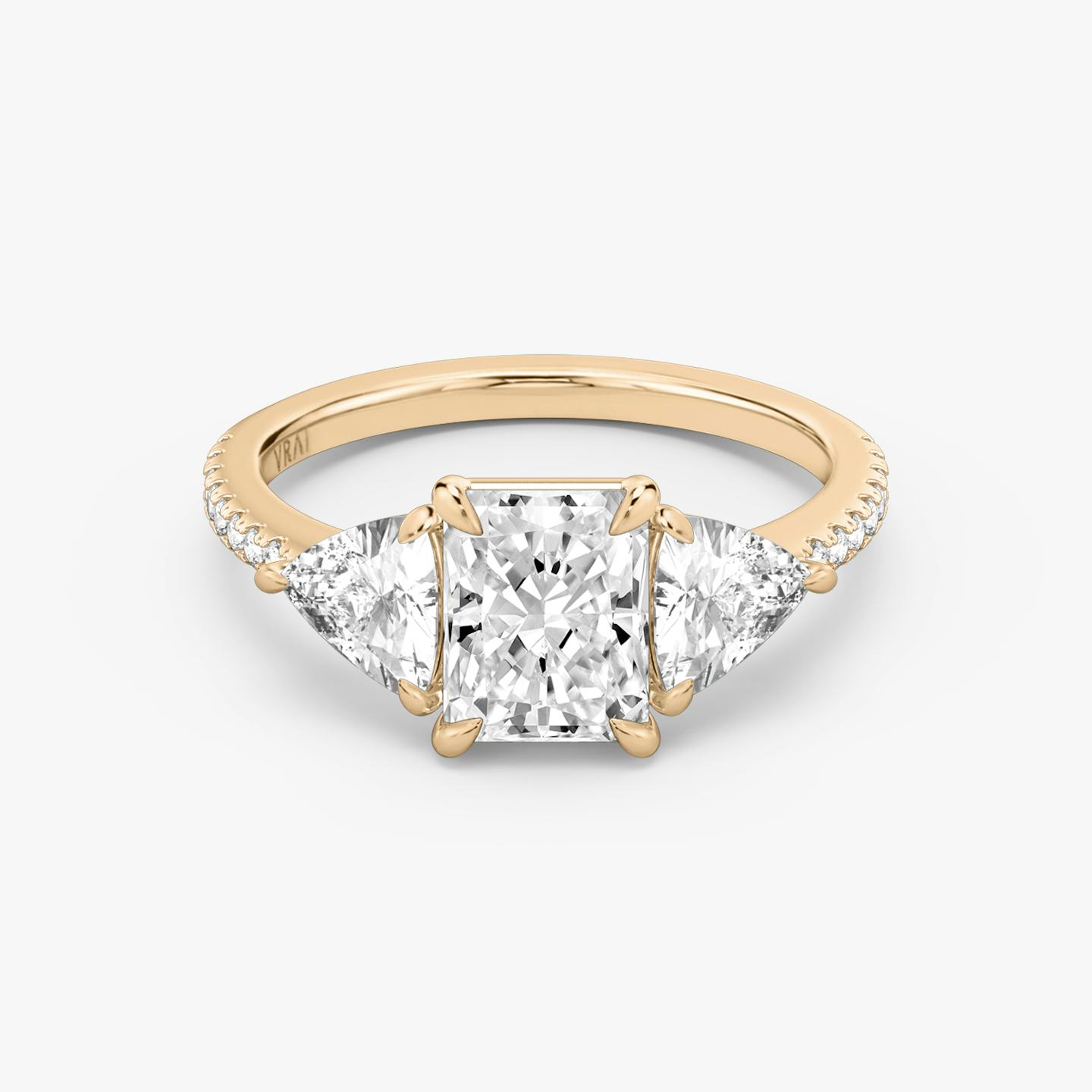 The Three Stone | Radiant | 14k | 14k Rose Gold | Band: Pavé | Side stone carat: 1/2 | Side stone shape: Trillion | Diamond orientation: vertical | Carat weight: See full inventory