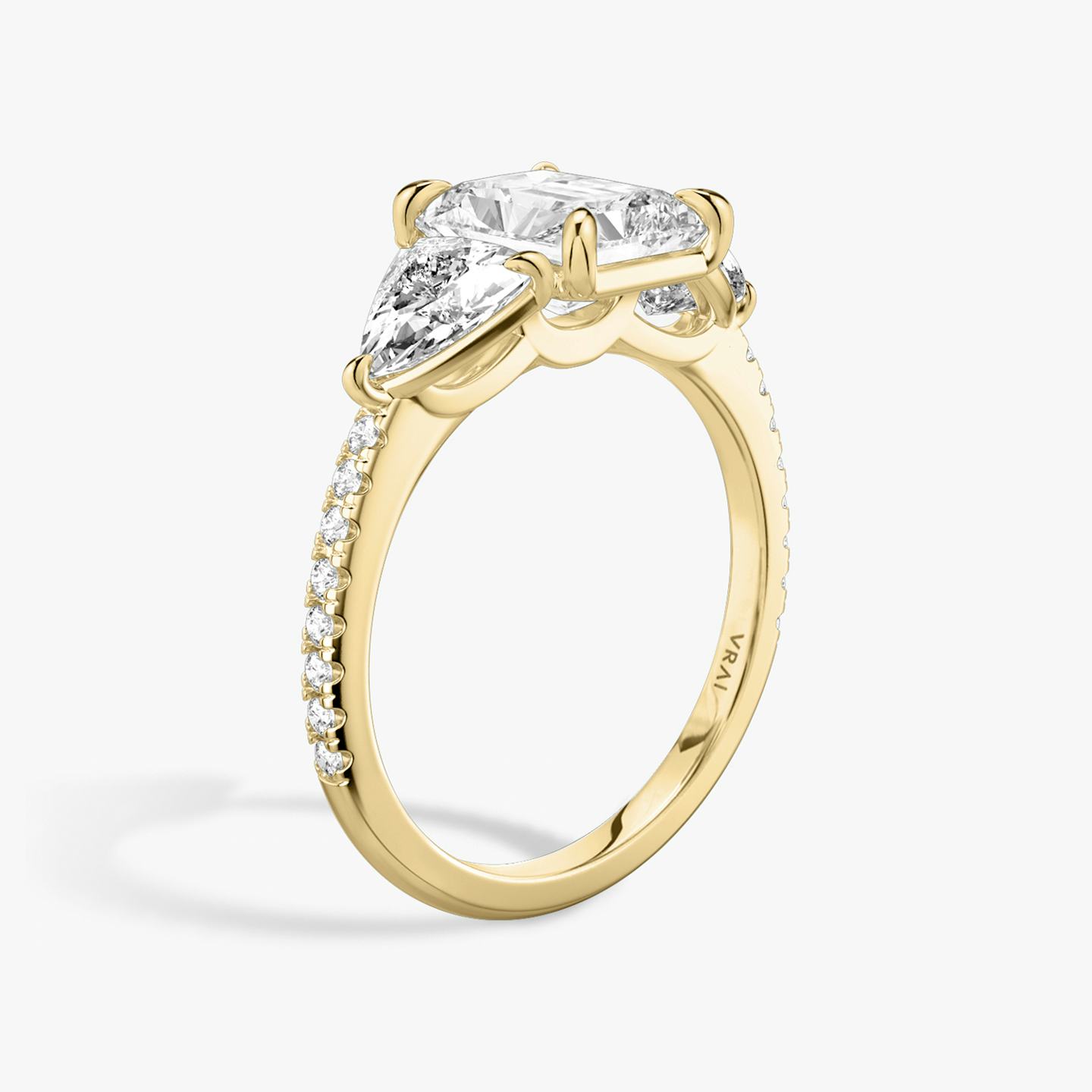 The Three Stone | Radiant | 18k | 18k Yellow Gold | Band: Pavé | Side stone carat: 1/2 | Side stone shape: Trillion | Diamond orientation: vertical | Carat weight: See full inventory