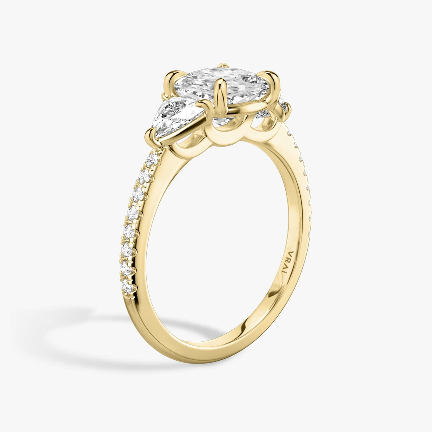 The Three Stone | Pavé Cushion | 18k | 18k Yellow Gold | Band: Pavé | Side stone carat: 1/4 | Side stone shape: Trillion | Diamond orientation: vertical | Carat weight: See full inventory