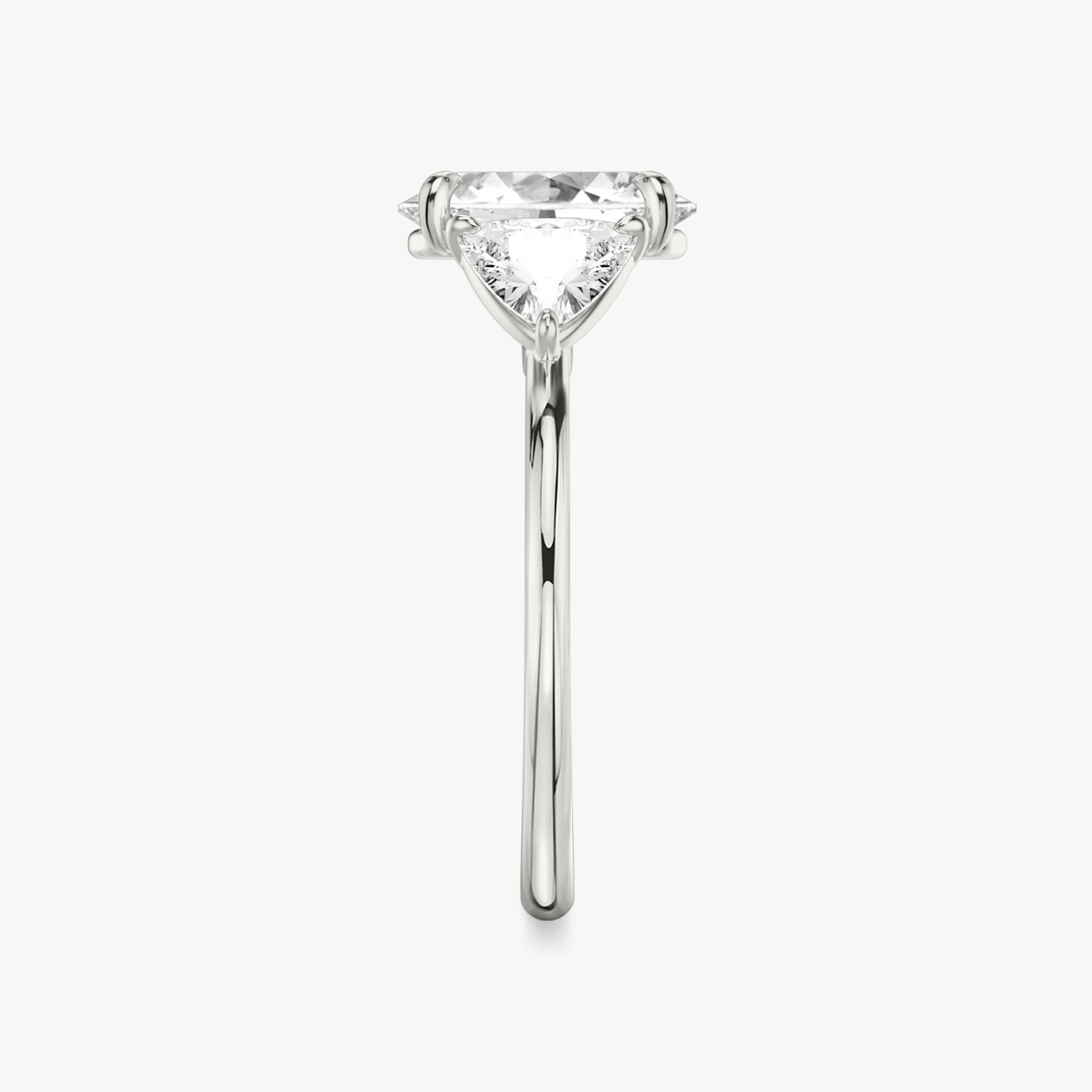 The Three Stone | Oval | Platinum | Band: Plain | Side stone carat: 1/2 | Side stone shape: Trillion | Diamond orientation: vertical | Carat weight: See full inventory
