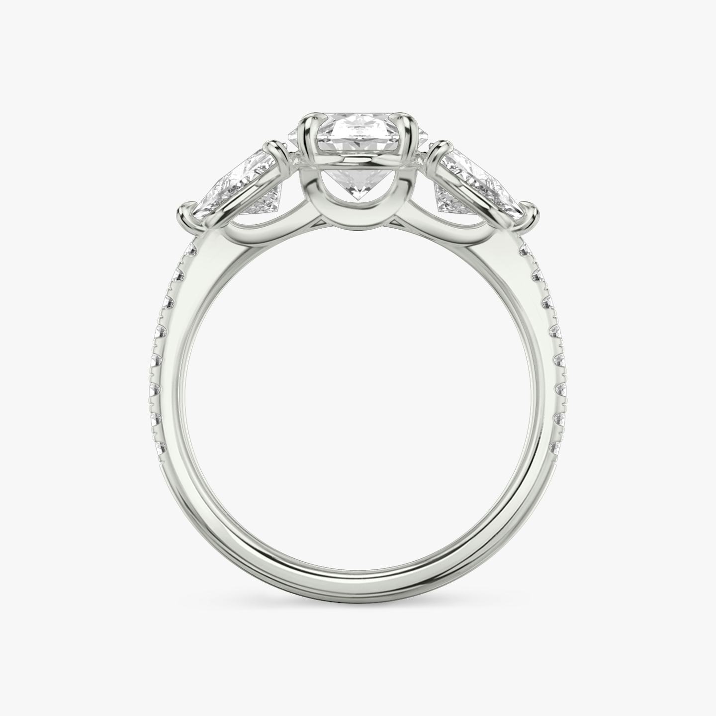 The Three Stone | Oval | 18k | 18k White Gold | Band: Pavé | Side stone carat: 1/2 | Side stone shape: Trillion | Diamond orientation: vertical | Carat weight: See full inventory